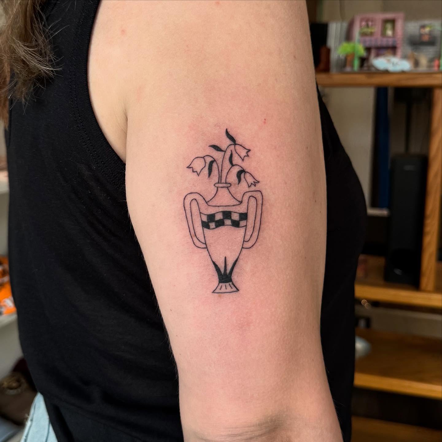Vase with flowers black and grey tattoo on the forearm by house0fsleep 💤