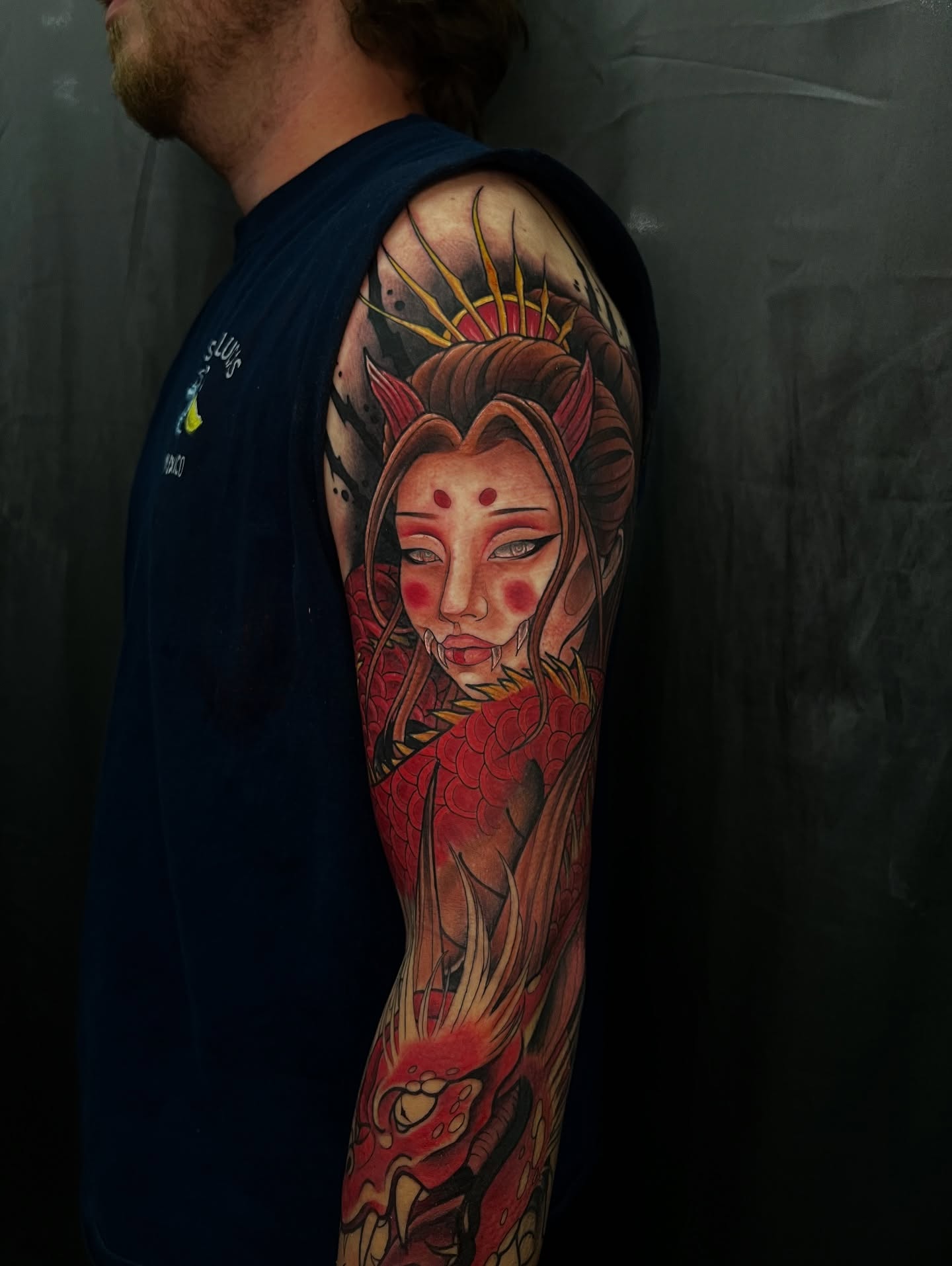 Geisha with dragon japanese irezumi tattoo on the upper arm by BodyArtByAlia