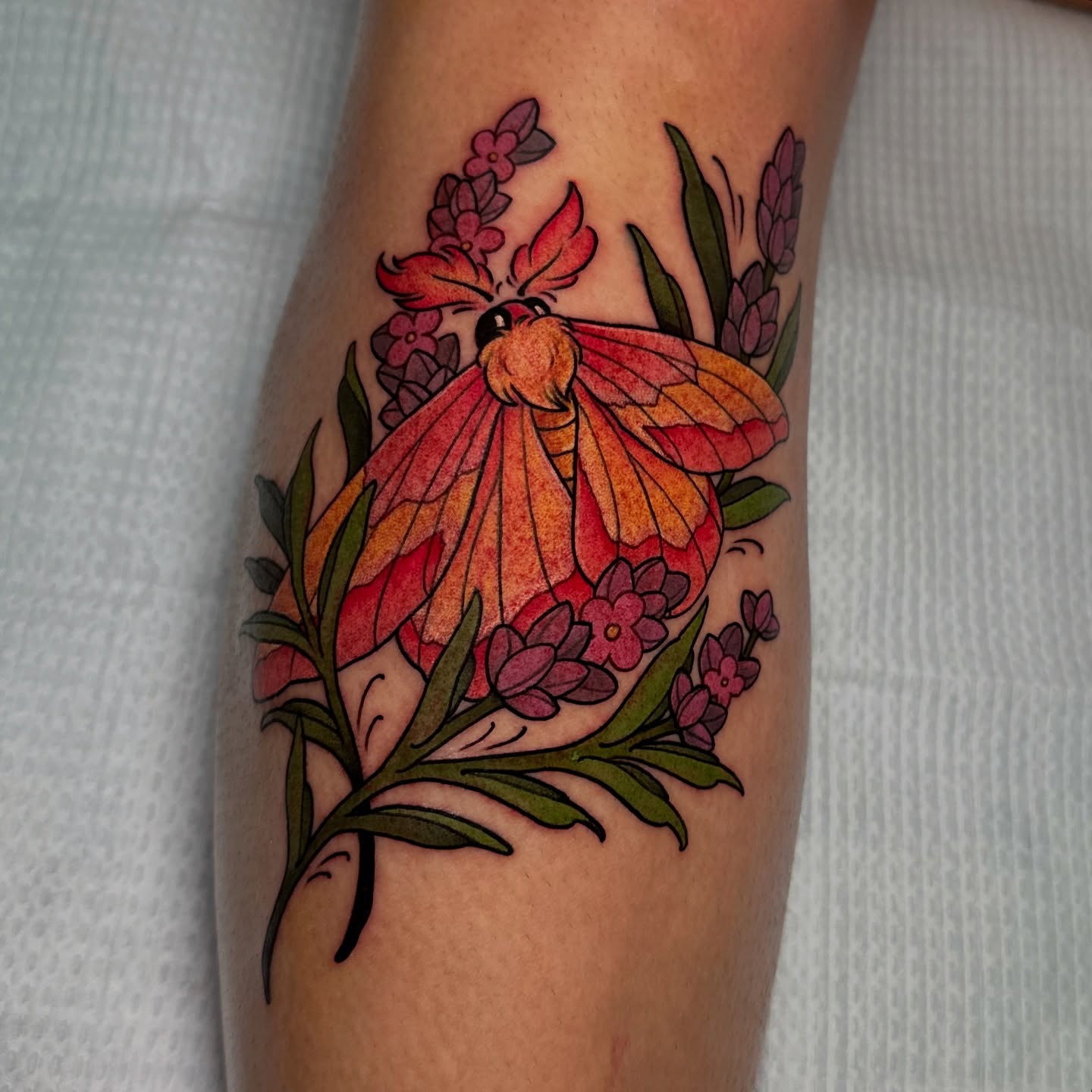 Butterfly and flowers new school tattoo on the forearm by Tayler Pearson, Fort Collins, Colorado