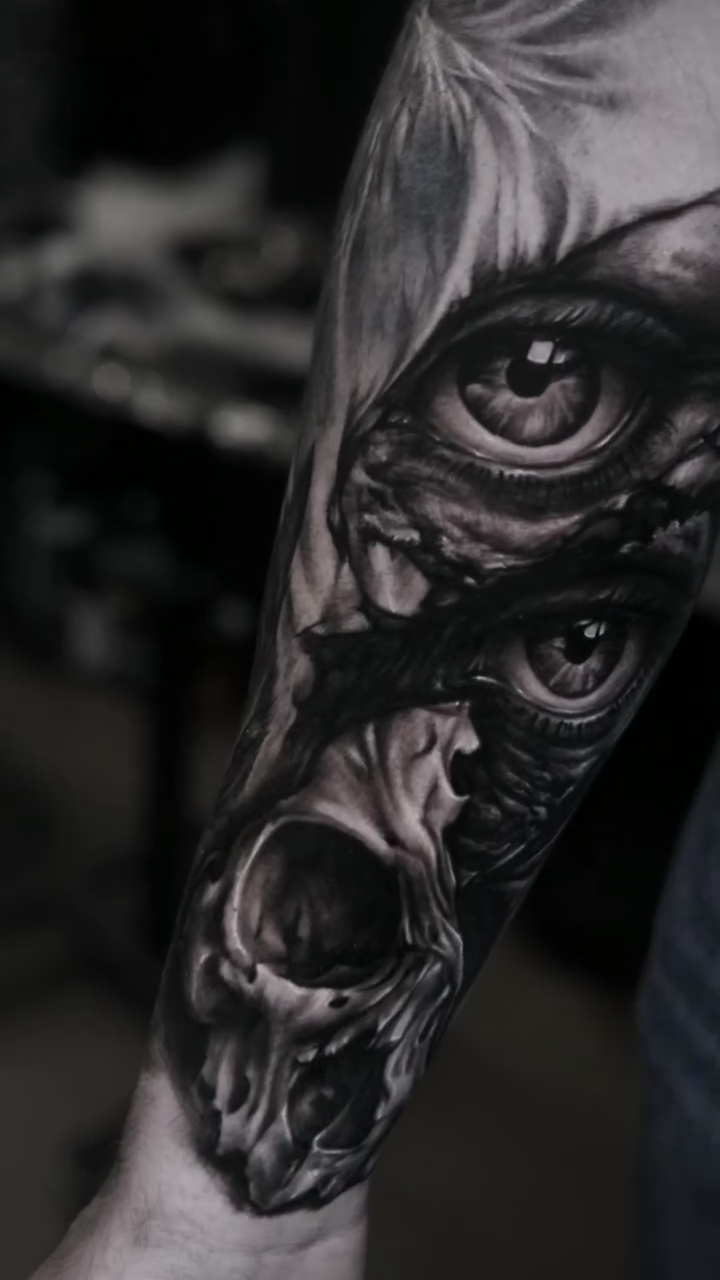 Skull and eyes dark realism tattoo by Gregorio Devera