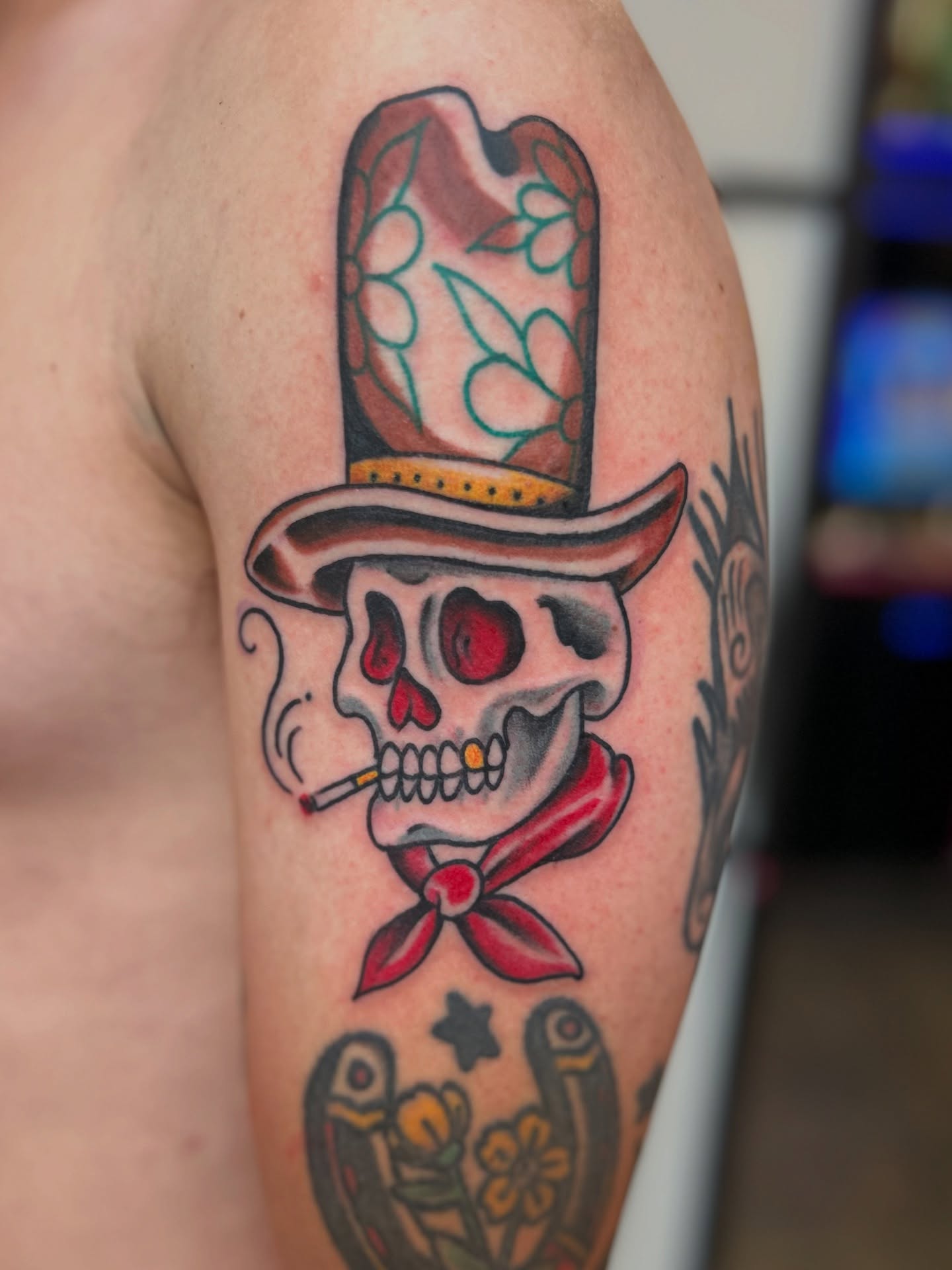 Skull wearing top hat American traditional tattoo on the forearm by Ryan Willard, Denver, Colorado