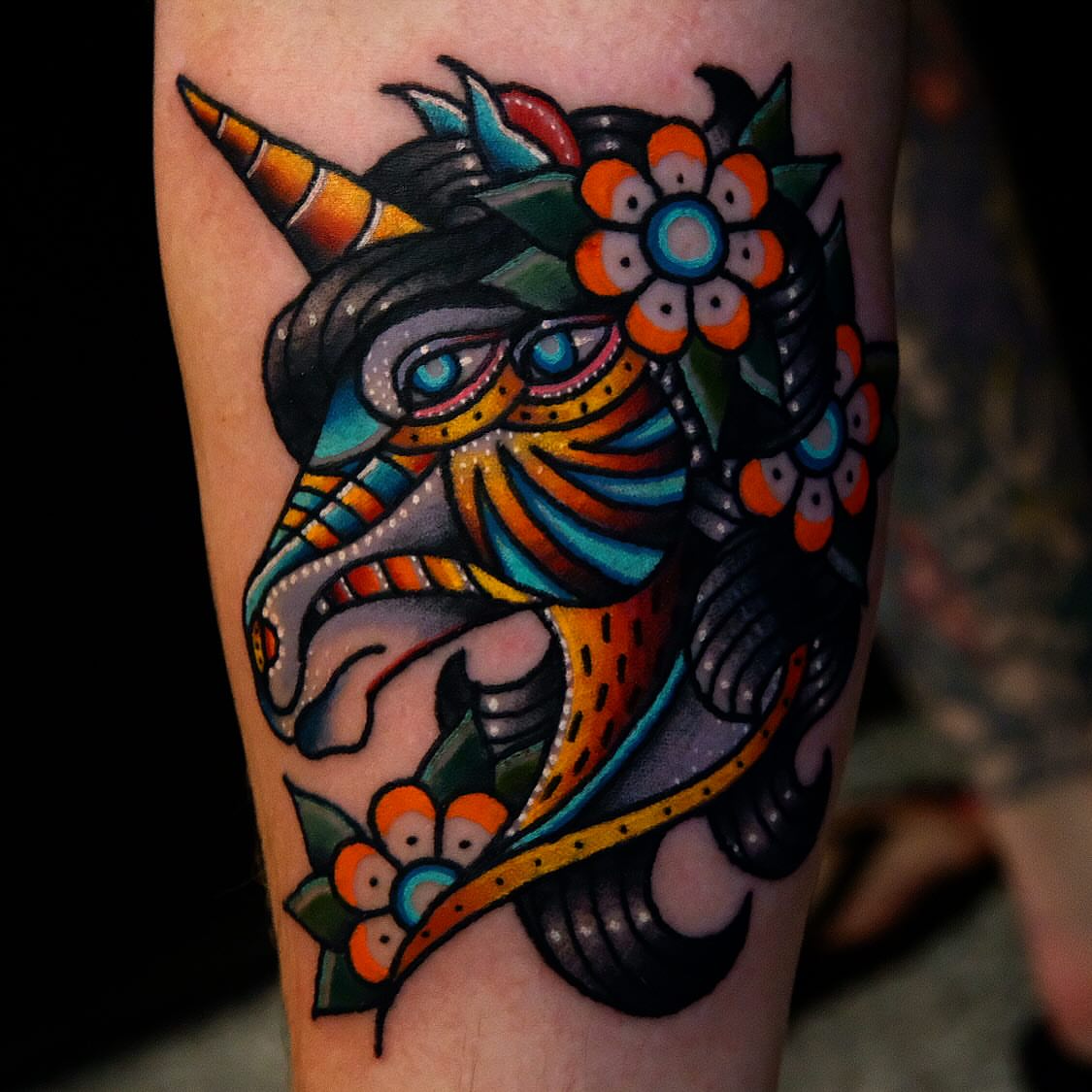 Unicorn American traditional tattoo on the forearm by Don Boos Tattoos