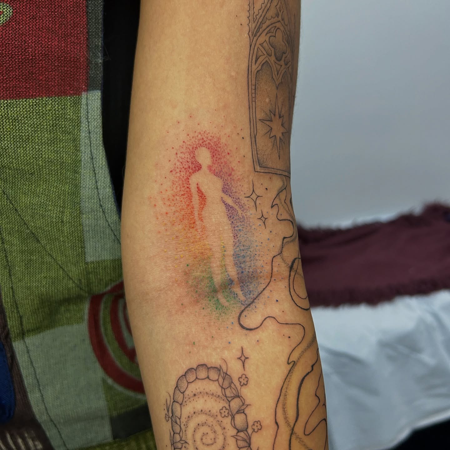 Tattoo by @sweetcarolinetattoo — dotwork, watercolor