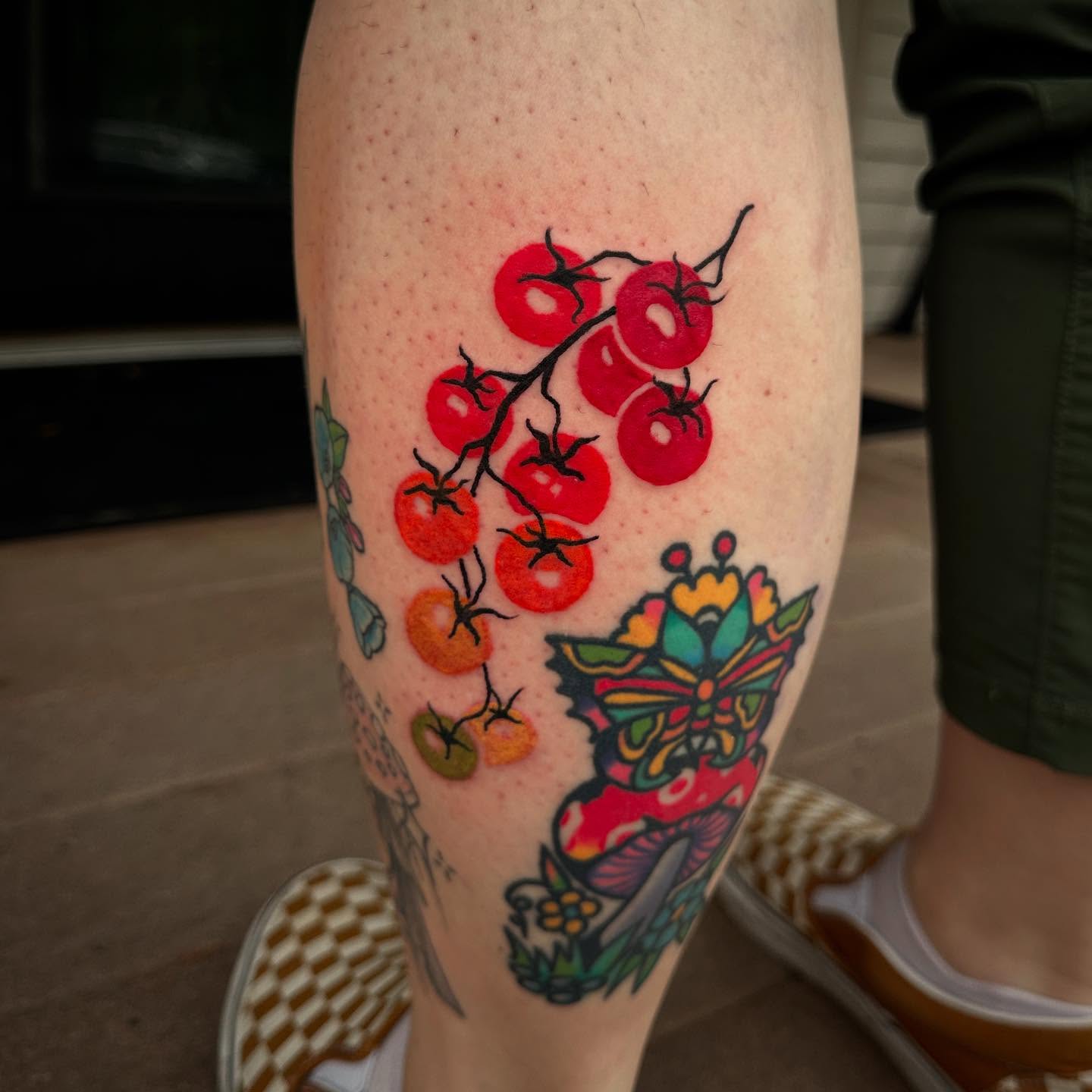 Tomatoes and butterfly American traditional tattoo on the forearm by manda, Lebanon, Ohio