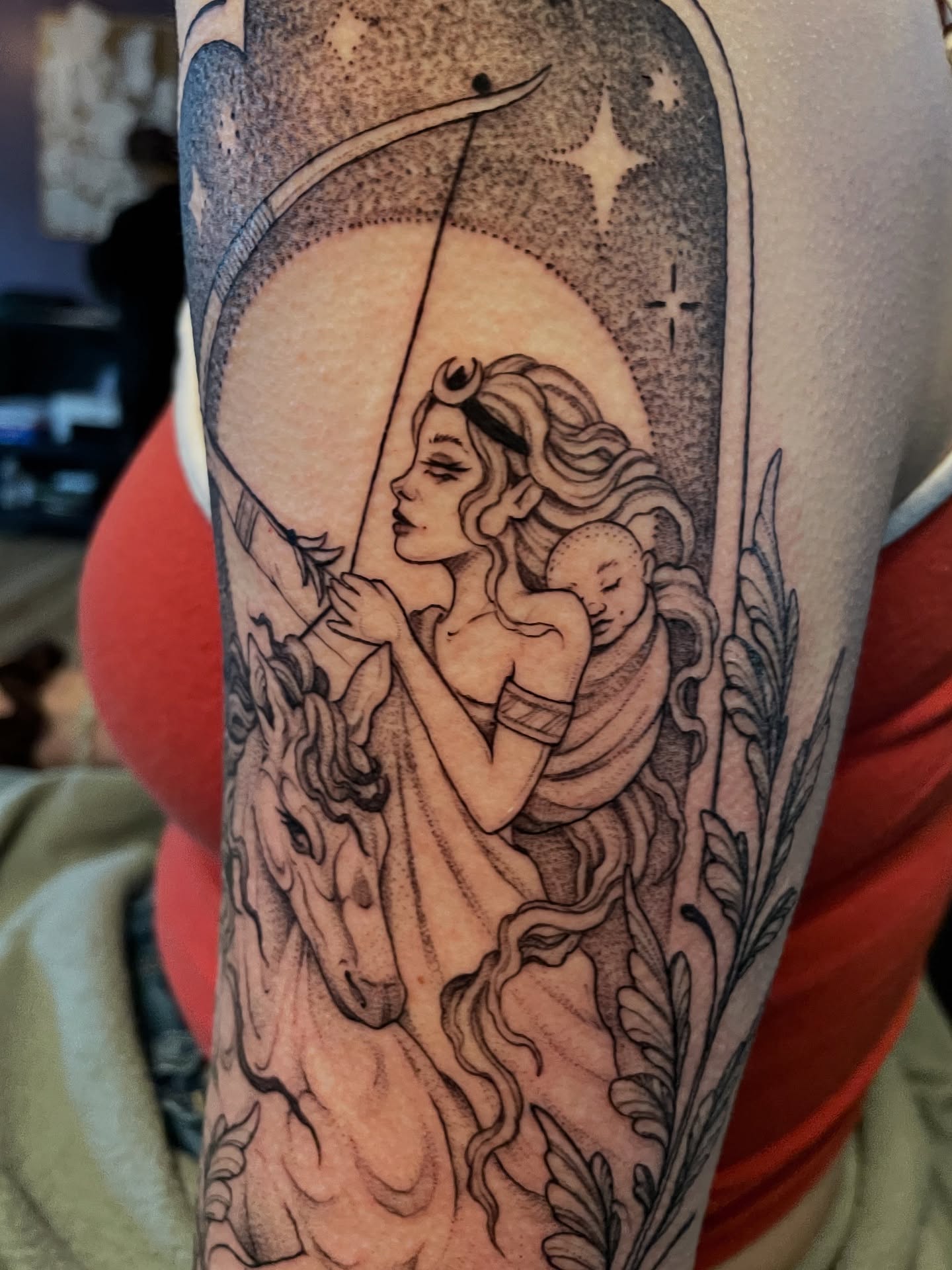 Archer with child and unicorn realism tattoo on the forearm by @jettaturas, New City, New York