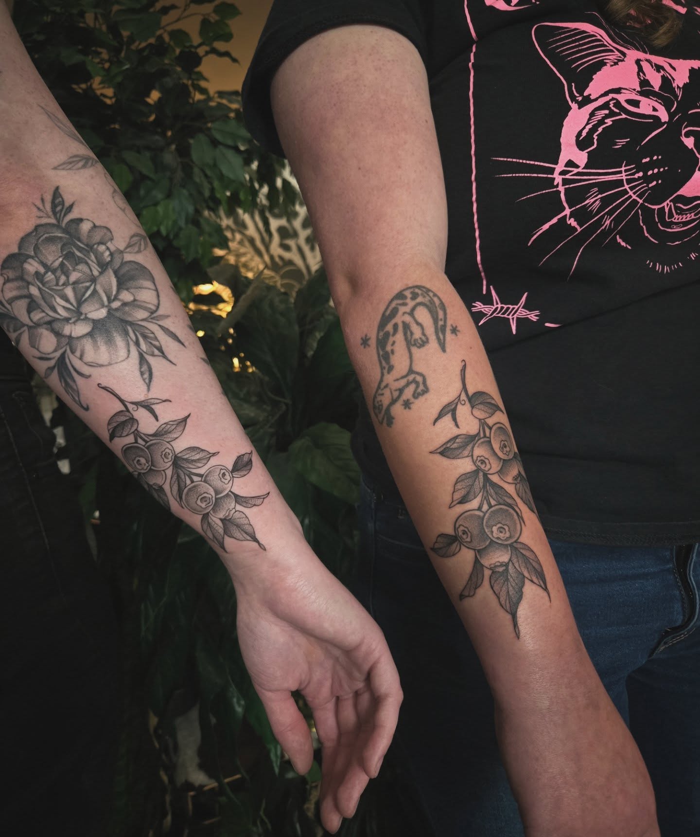 Floral and fruit black and grey tattoo on the forearm by Alexandra Colella ✨️