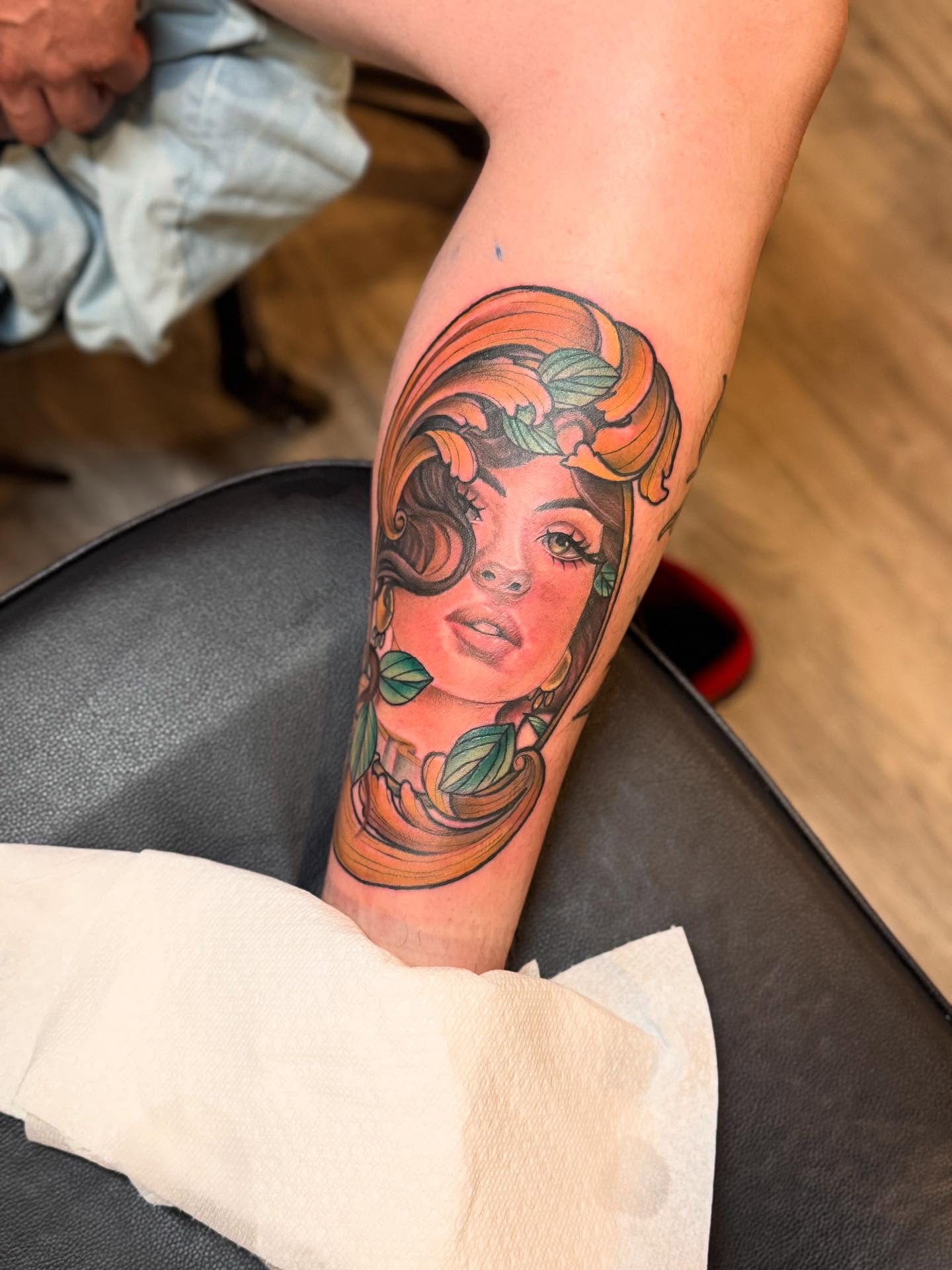 Woman's face realism tattoo on the forearm by Stephanie Cruz, Kansas City, Missouri