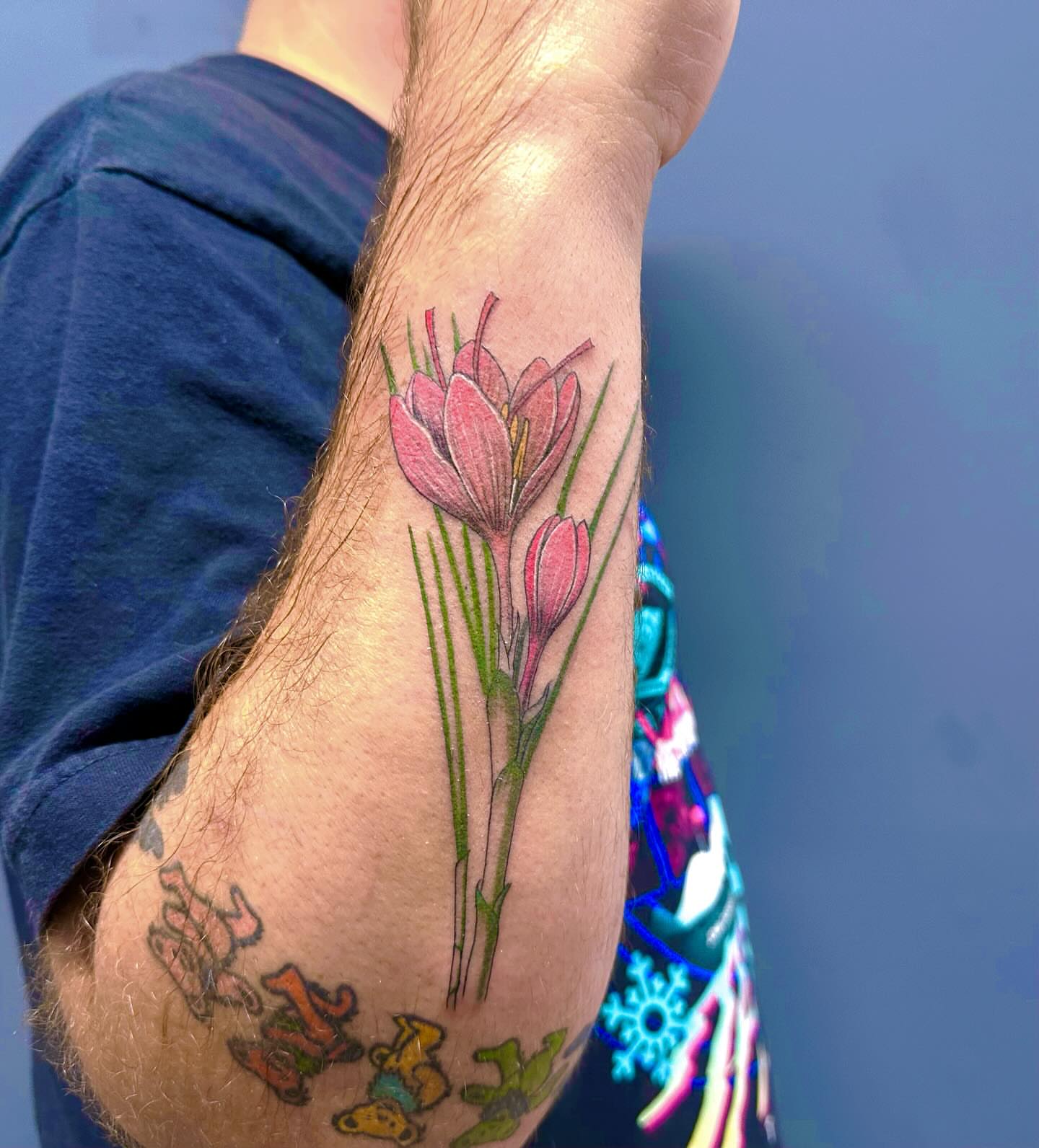 Crocus flowers realism tattoo on the forearm by mia's tattoo, Los Angeles, California