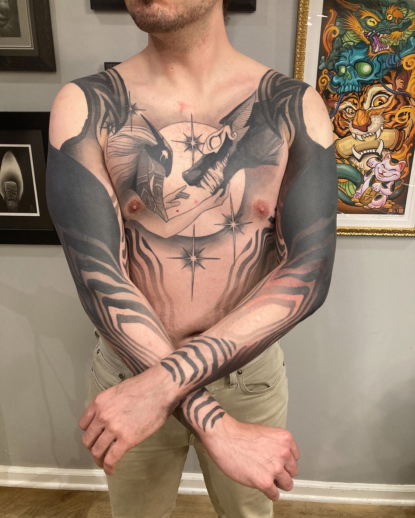 Wolf and moon realism tattoo on the chest by Rizzie D'Alterio