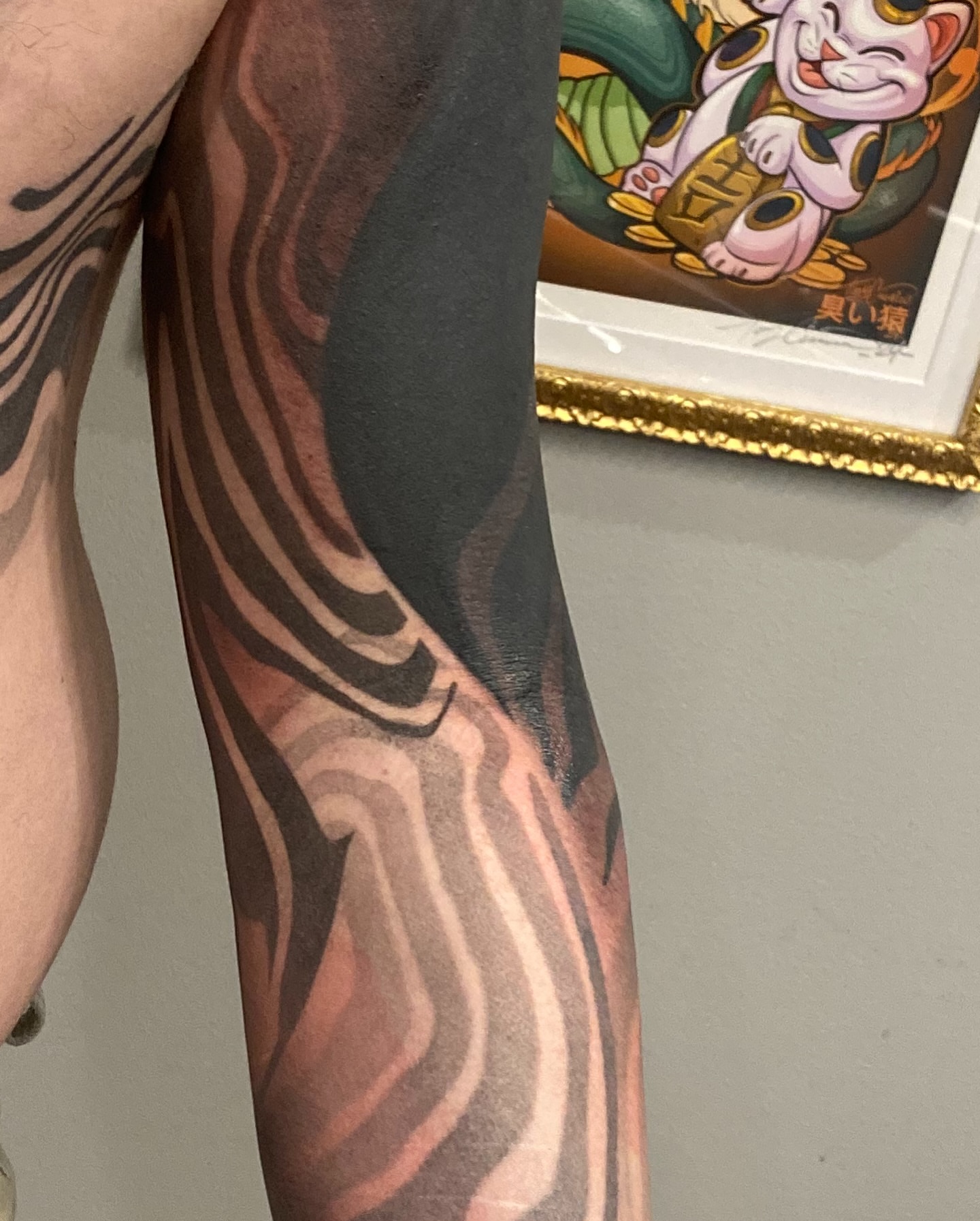 Abstract pattern black and grey tattoo on the forearm by Rizzie D'Alterio