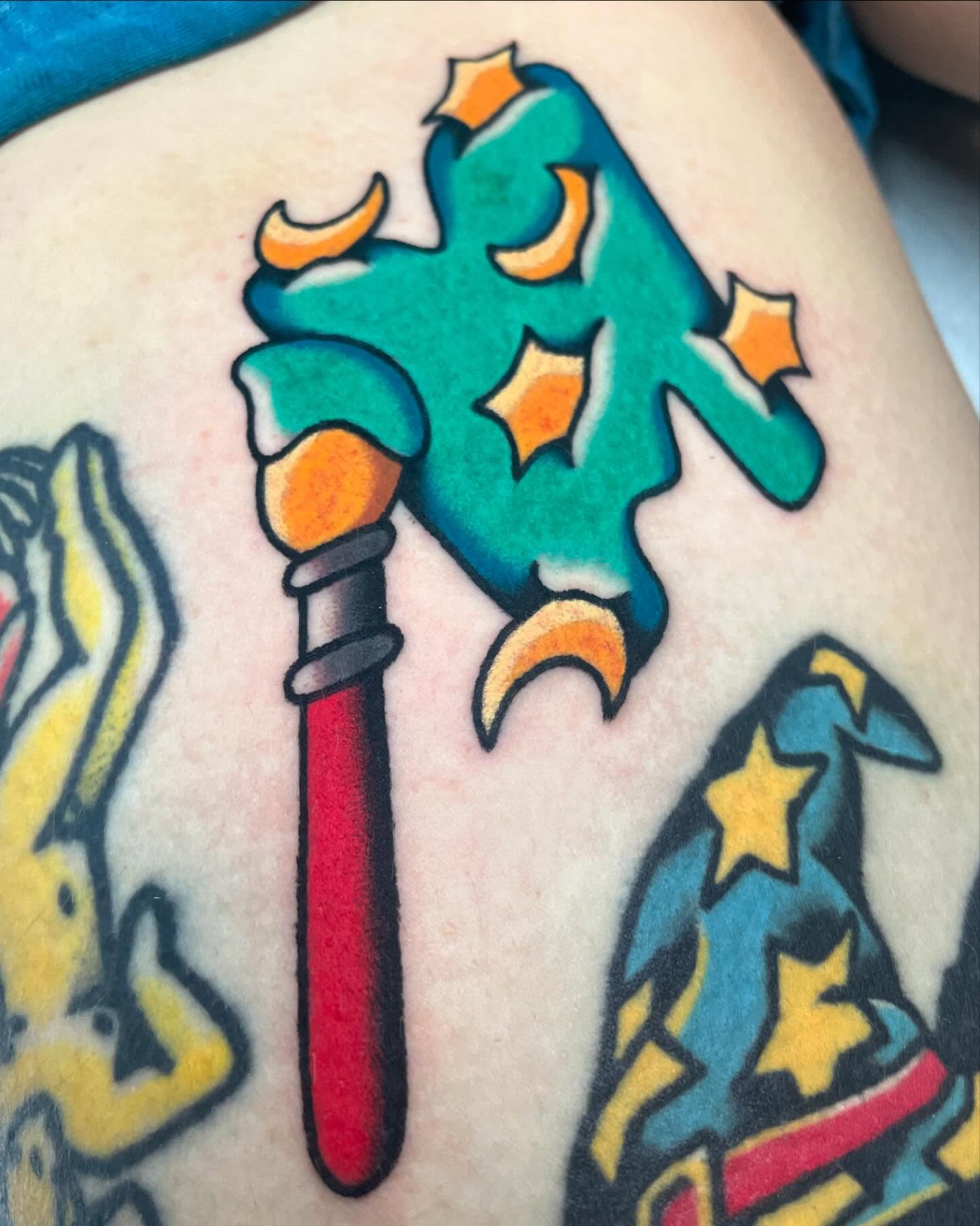 Wizard staff American traditional tattoo on the shoulder by Nova Vaughn