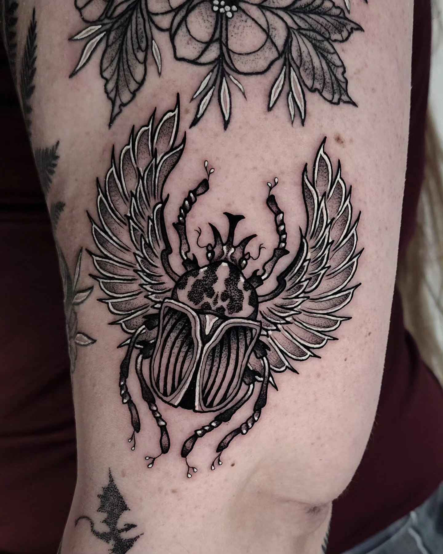 Scarab beetle black and grey tattoo on the forearm by Mariah Giovanna Hodgens