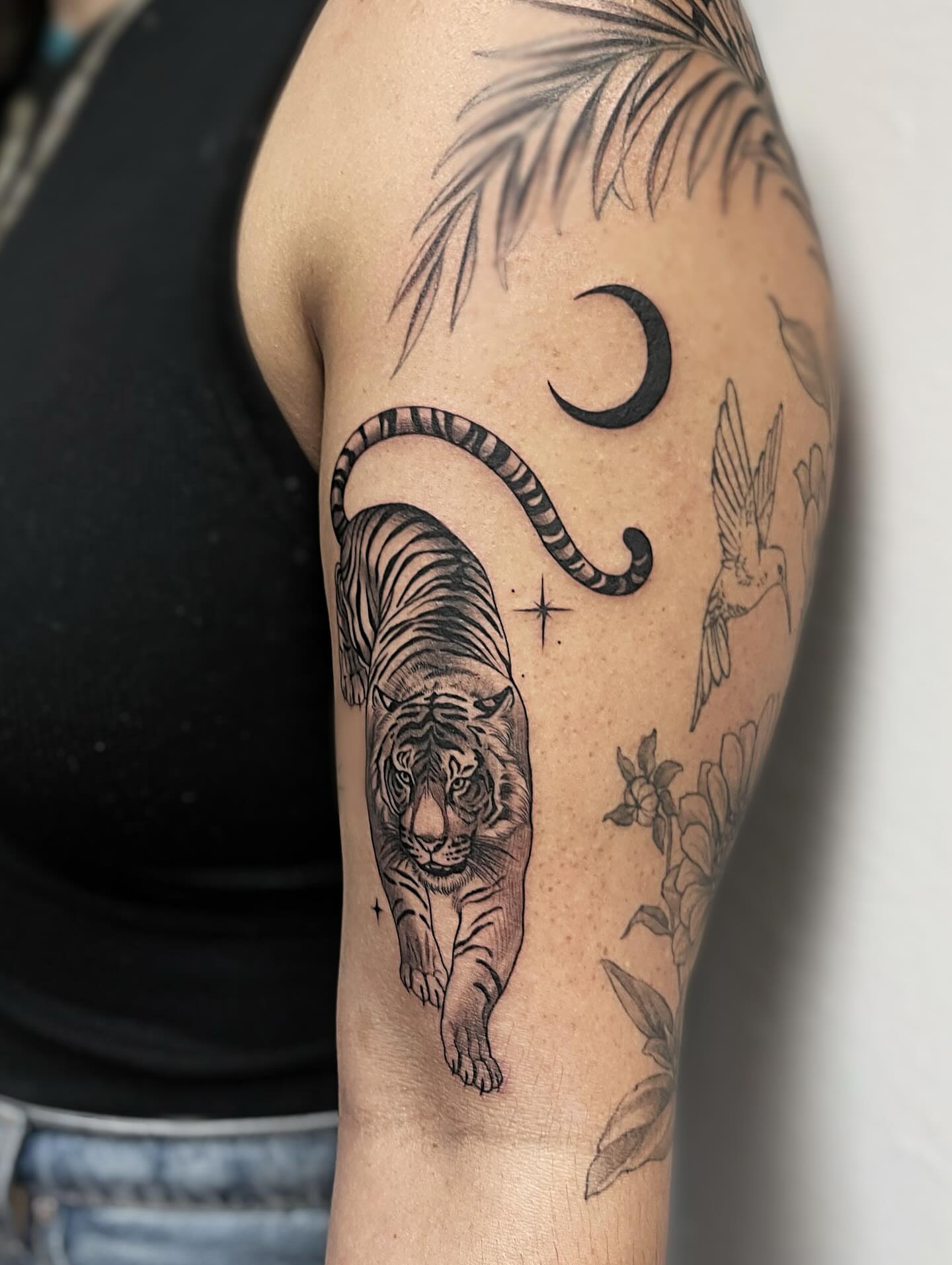 Tiger black and grey tattoo on the forearm by π‘πΆπΈπ½ππ ππΎππππ