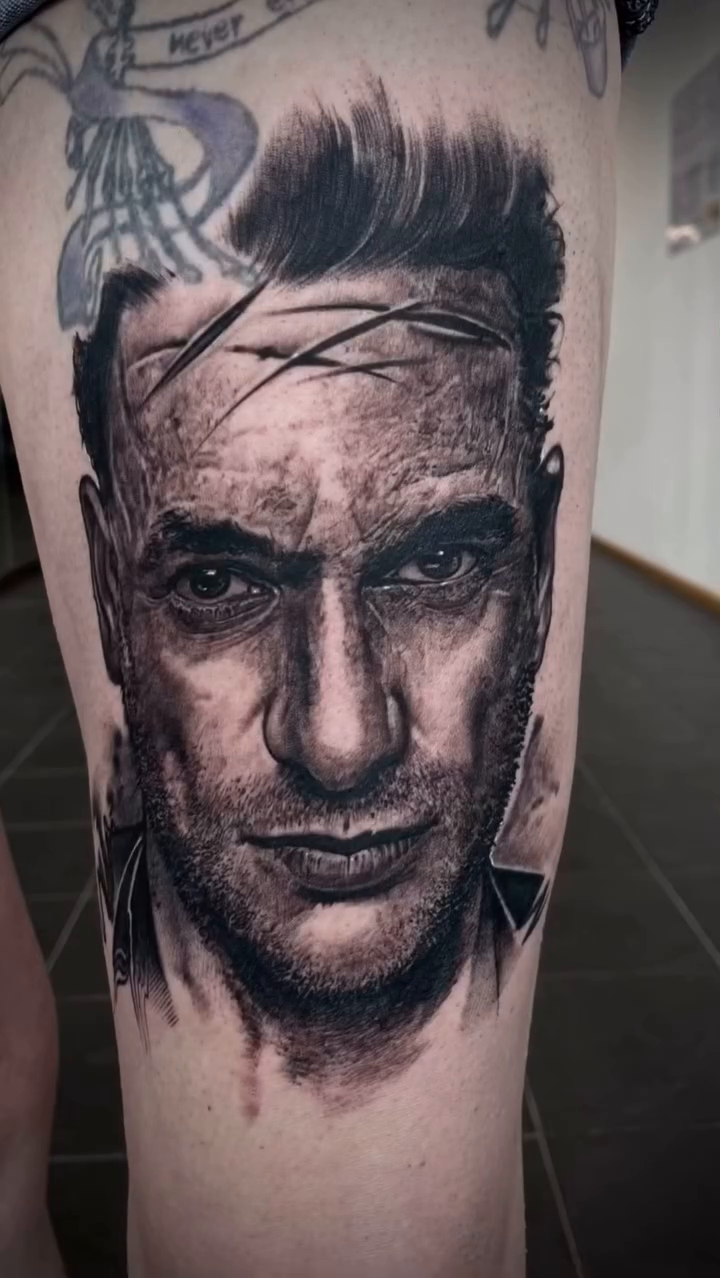 Portrait of a man realism tattoo by Robert Hernandez