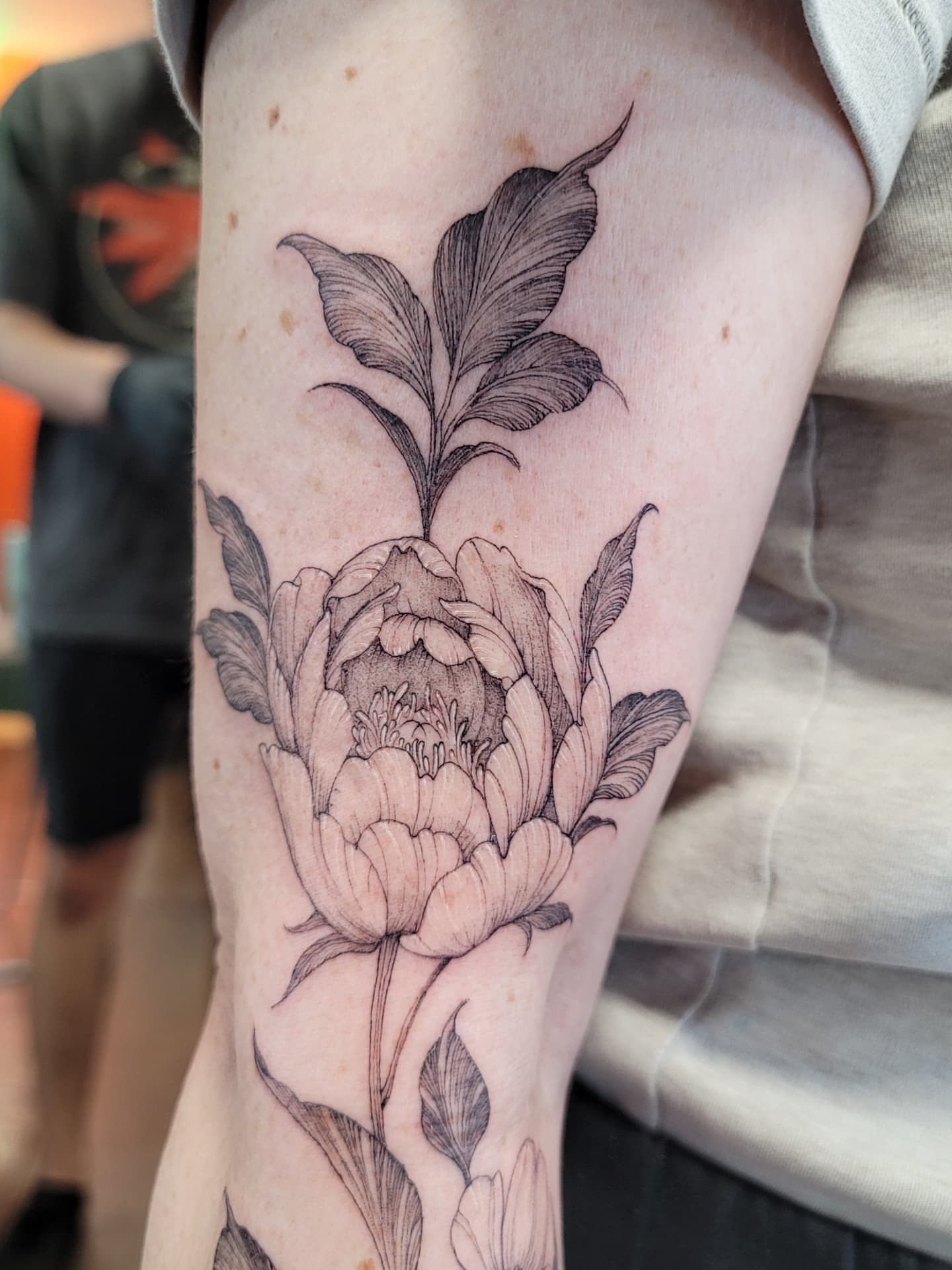 Peony black and grey tattoo on the forearm by Keith Countryman, Fort Worth, Texas