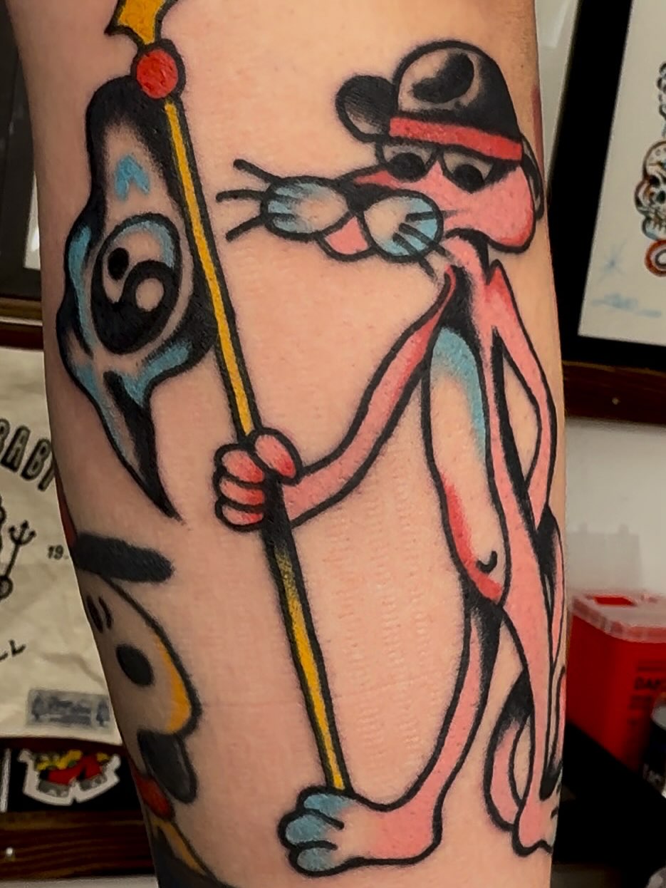 Pink panther American traditional tattoo on the forearm by Jimmy Ho