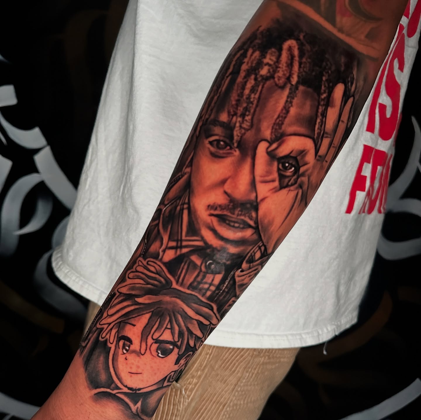 Anime character and man realism tattoo on the forearm by Drink Ink Tattoos™ 👽