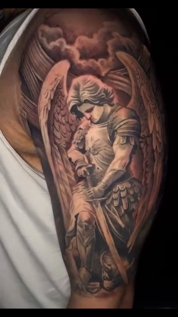 Angel warrior realism tattoo by Vic