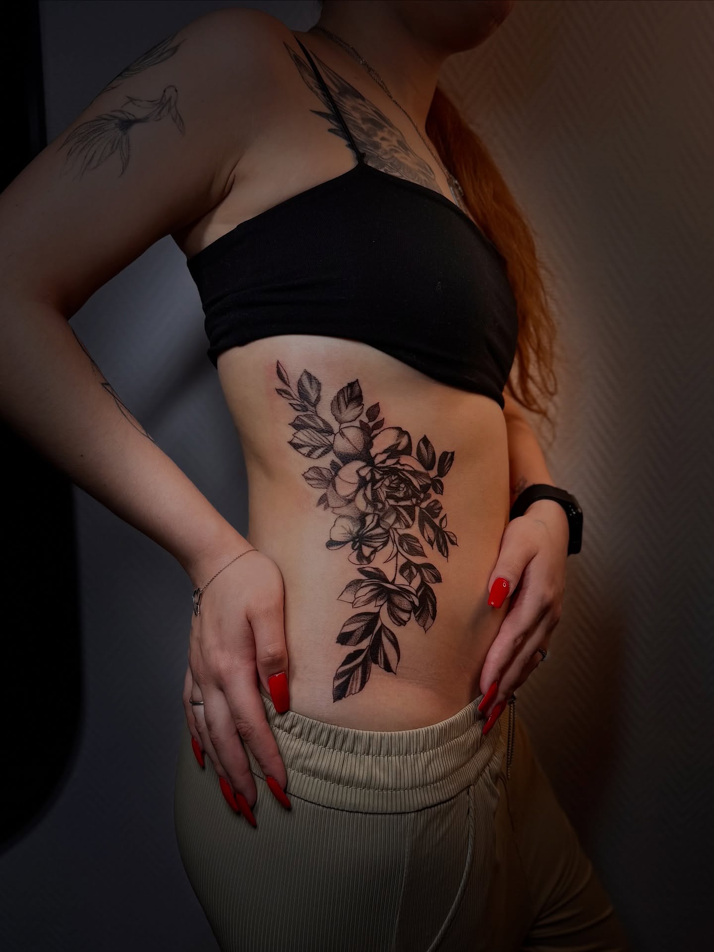 Floral bouquet black and grey tattoo on the ribs by Виктория Лукьянова
