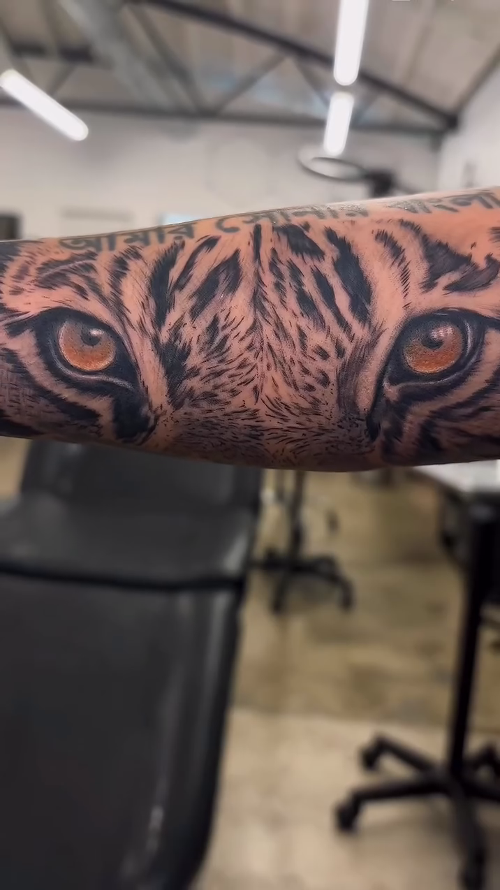 Tiger face realism tattoo by Ryan Walker