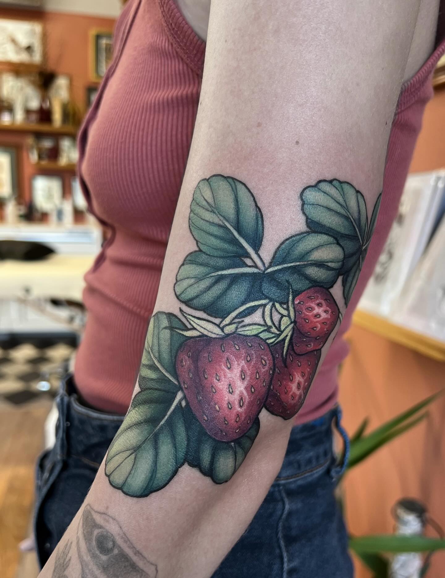 Strawberries realism tattoo on the forearm by β₯πΈππͺπ€π€π ππβπππβ₯