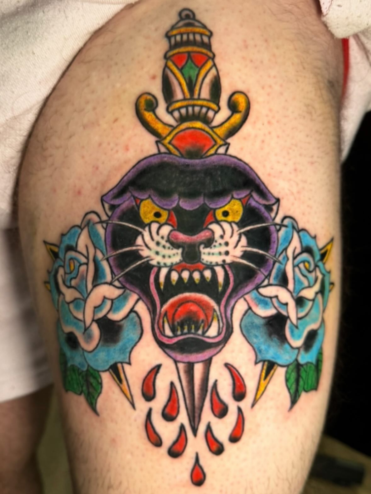 Panther head American traditional tattoo on the thigh by LeLe