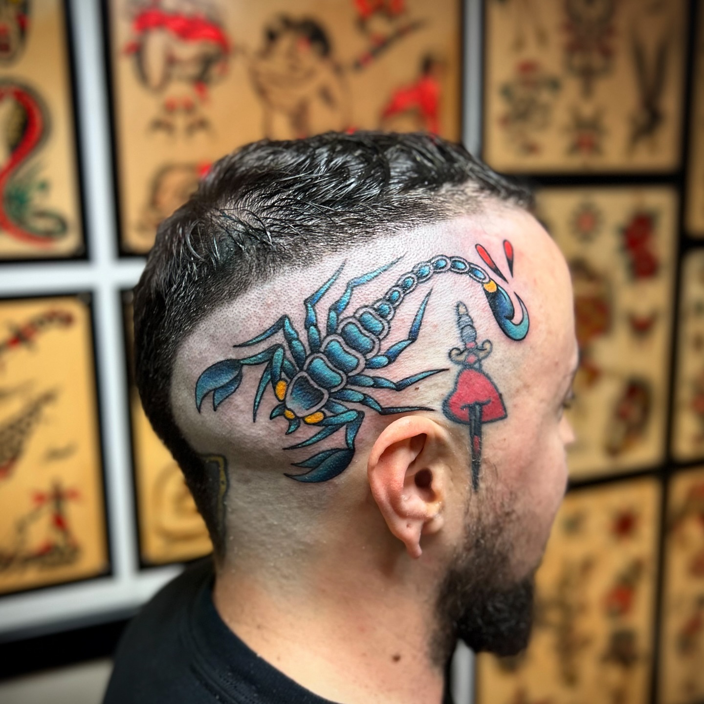 Scorpion and dagger American traditional tattoo on the head by Bright-bold-classic Tattoos, North Hills