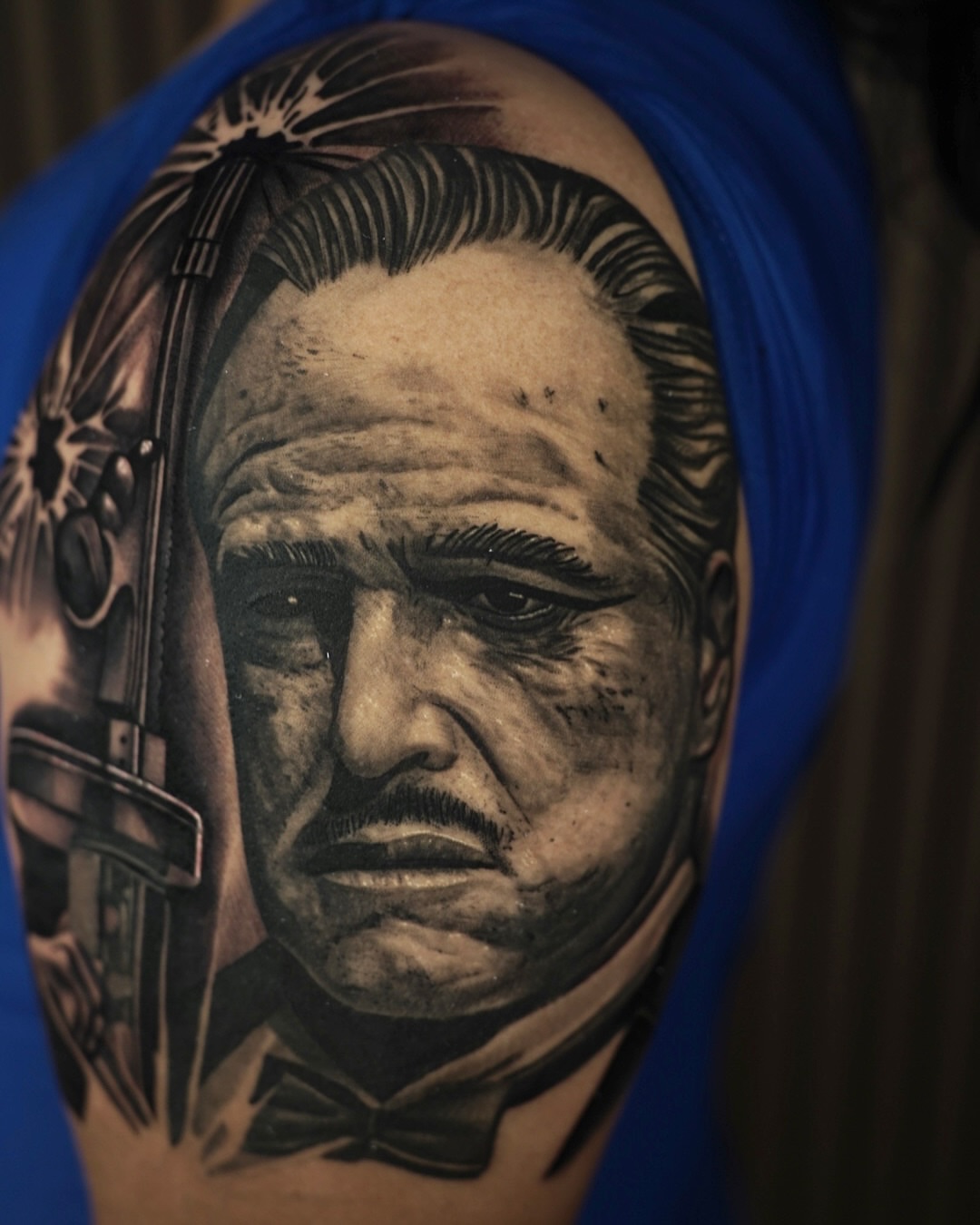 Don vito corleone realism tattoo on the shoulder by Travis