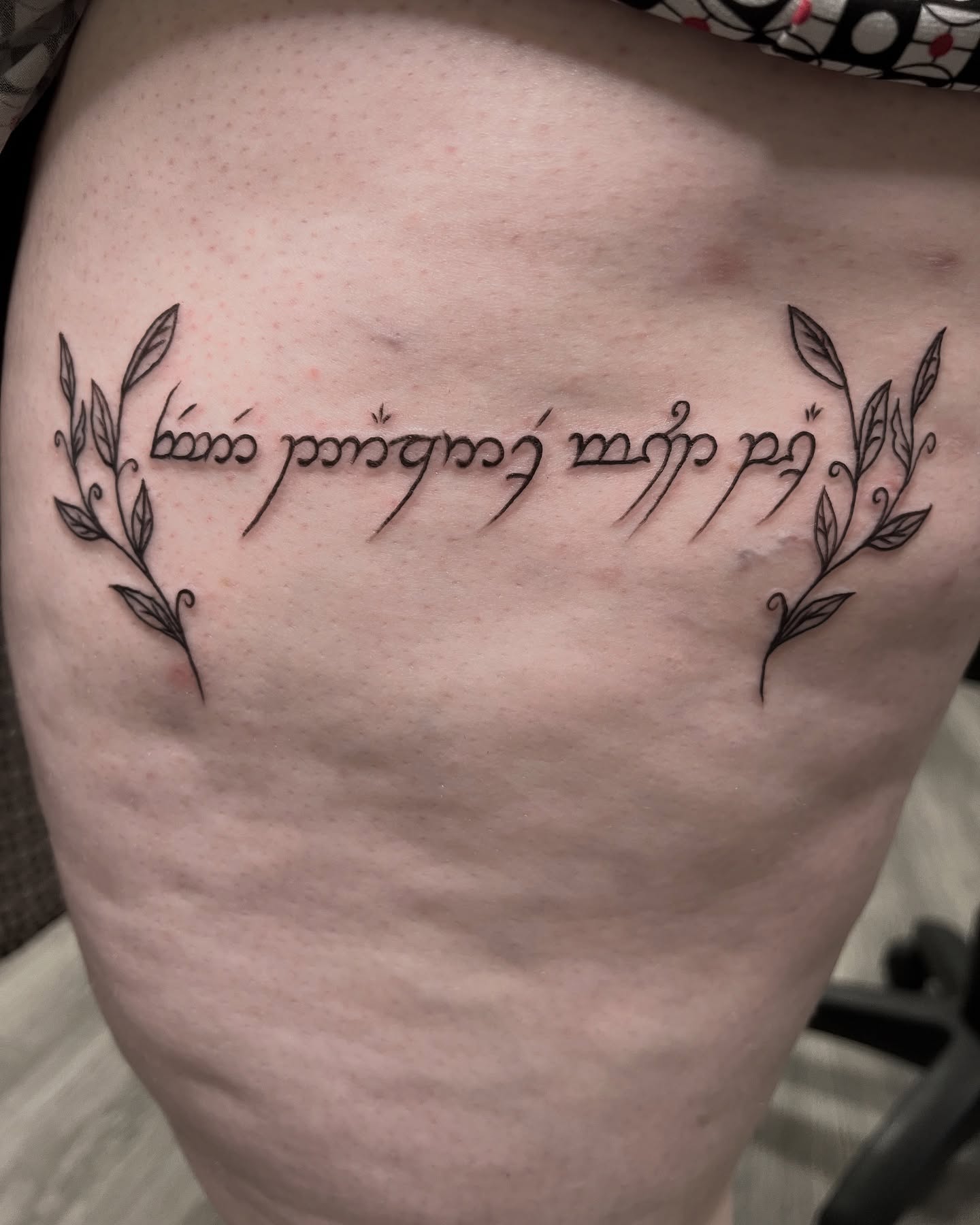 Elvish script fine line tattoo on the thigh by 🖤 Kitty Marie 🖤