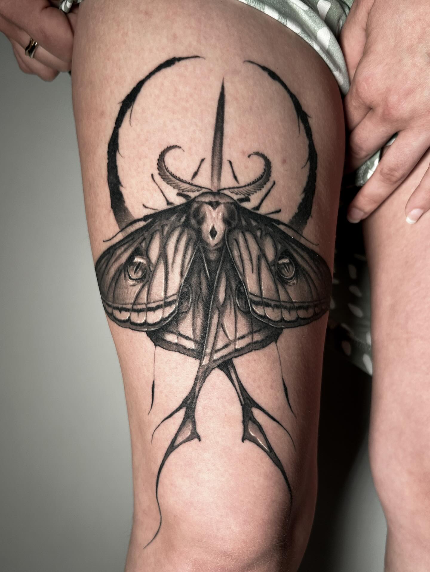 Moth realism tattoo on the thigh by Eltche Art Tattoo