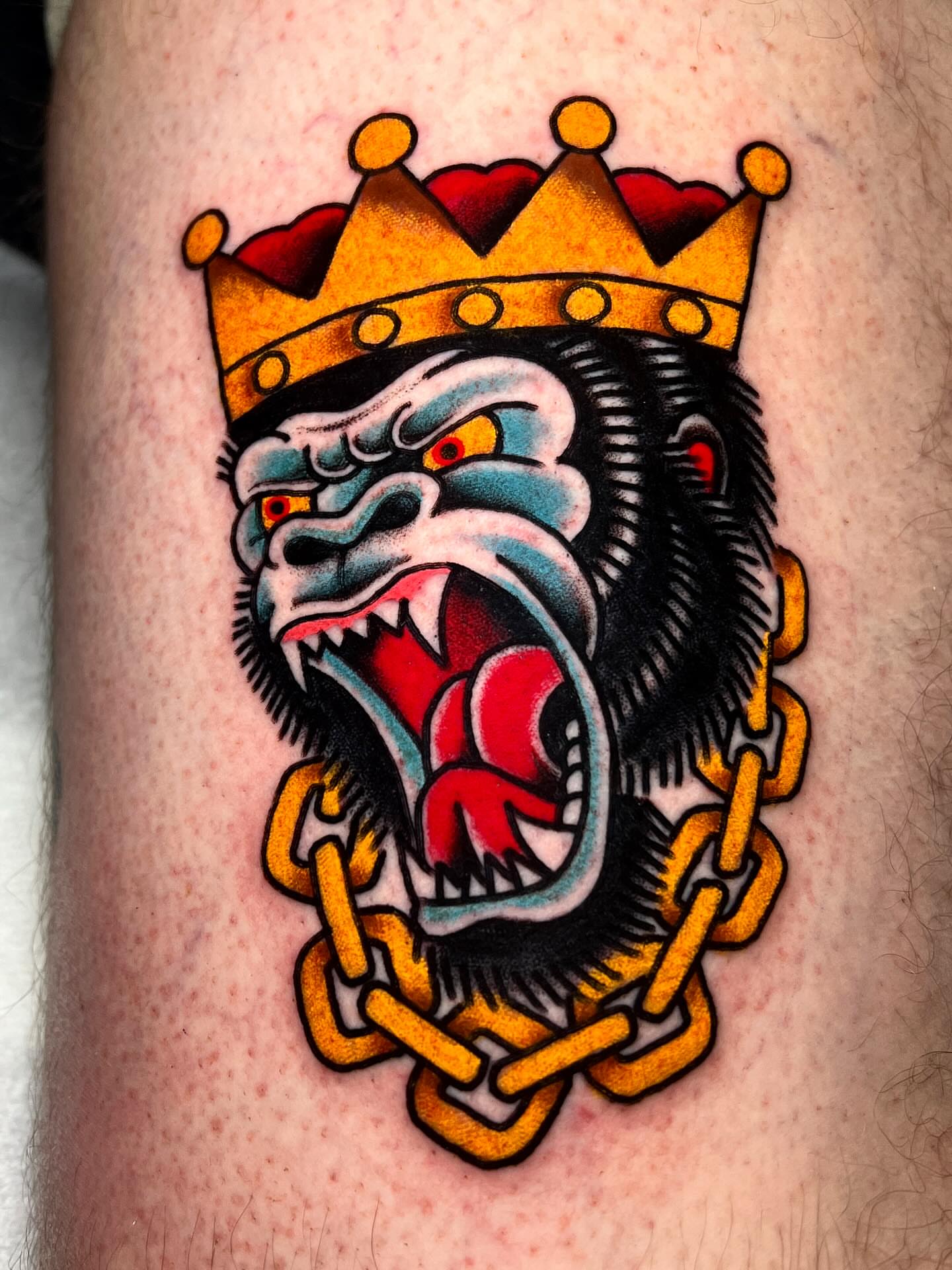 Gorilla crown American traditional tattoo on the forearm by ReadyFreddie_tattoo