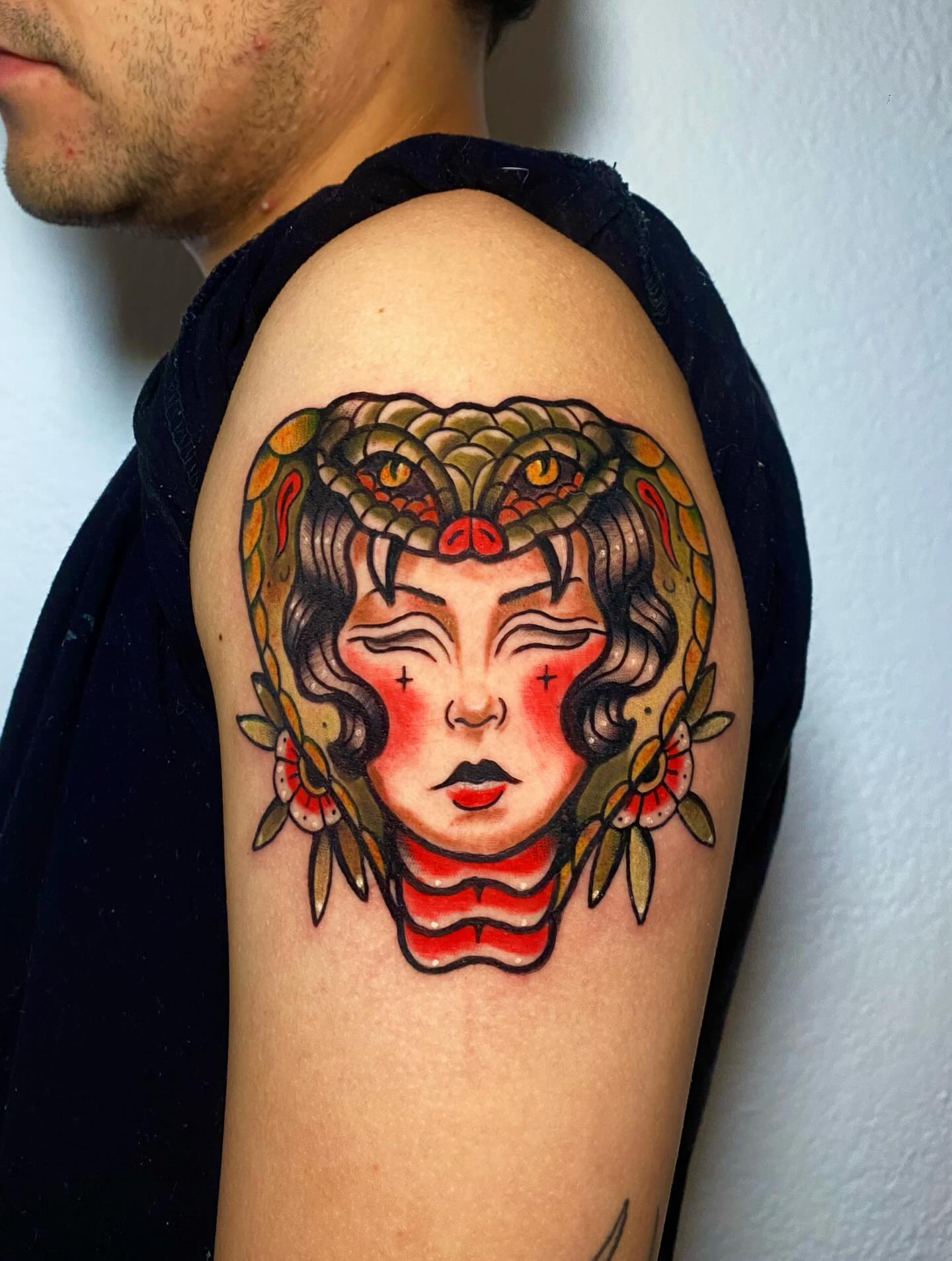 Woman with snake headdress American traditional tattoo on the shoulder by ✶ 𝑺𝑰𝑳𝑽𝑨𝑵𝑨