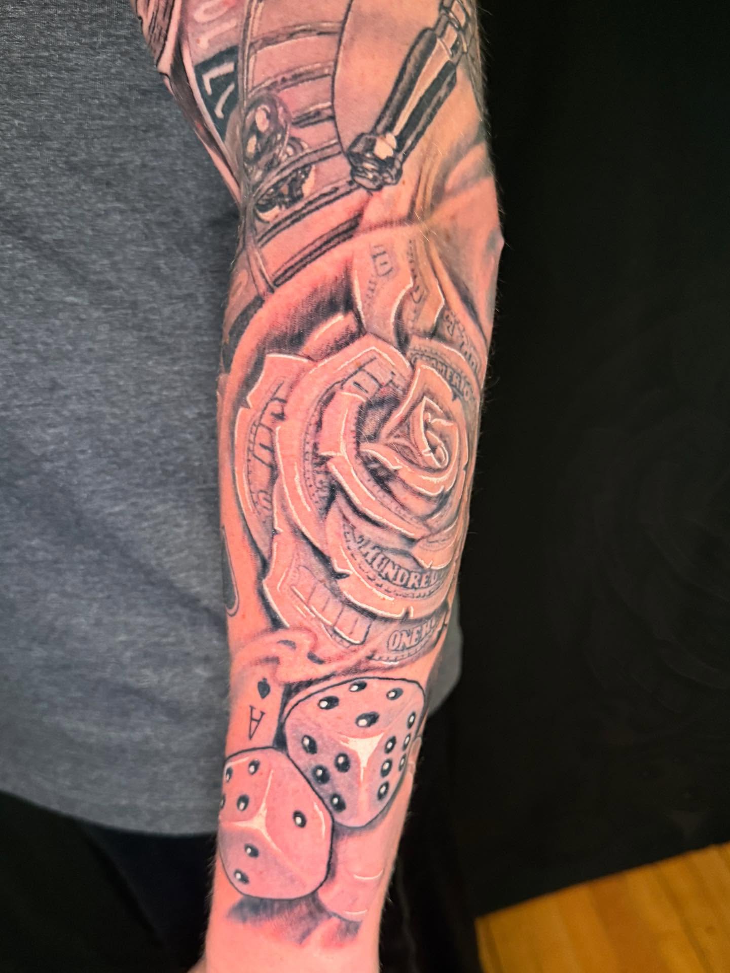 Mechanical rose realism tattoo on the forearm by Patrick Cornolo