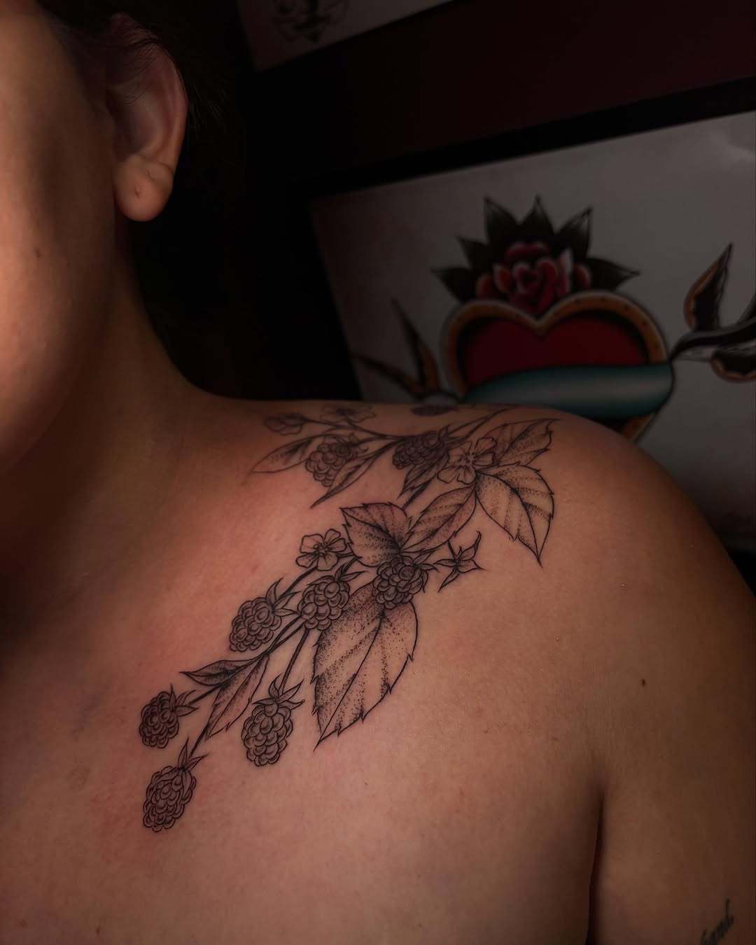 Raspberry branch minimalist tattoo on the shoulder by Gabby Finearts