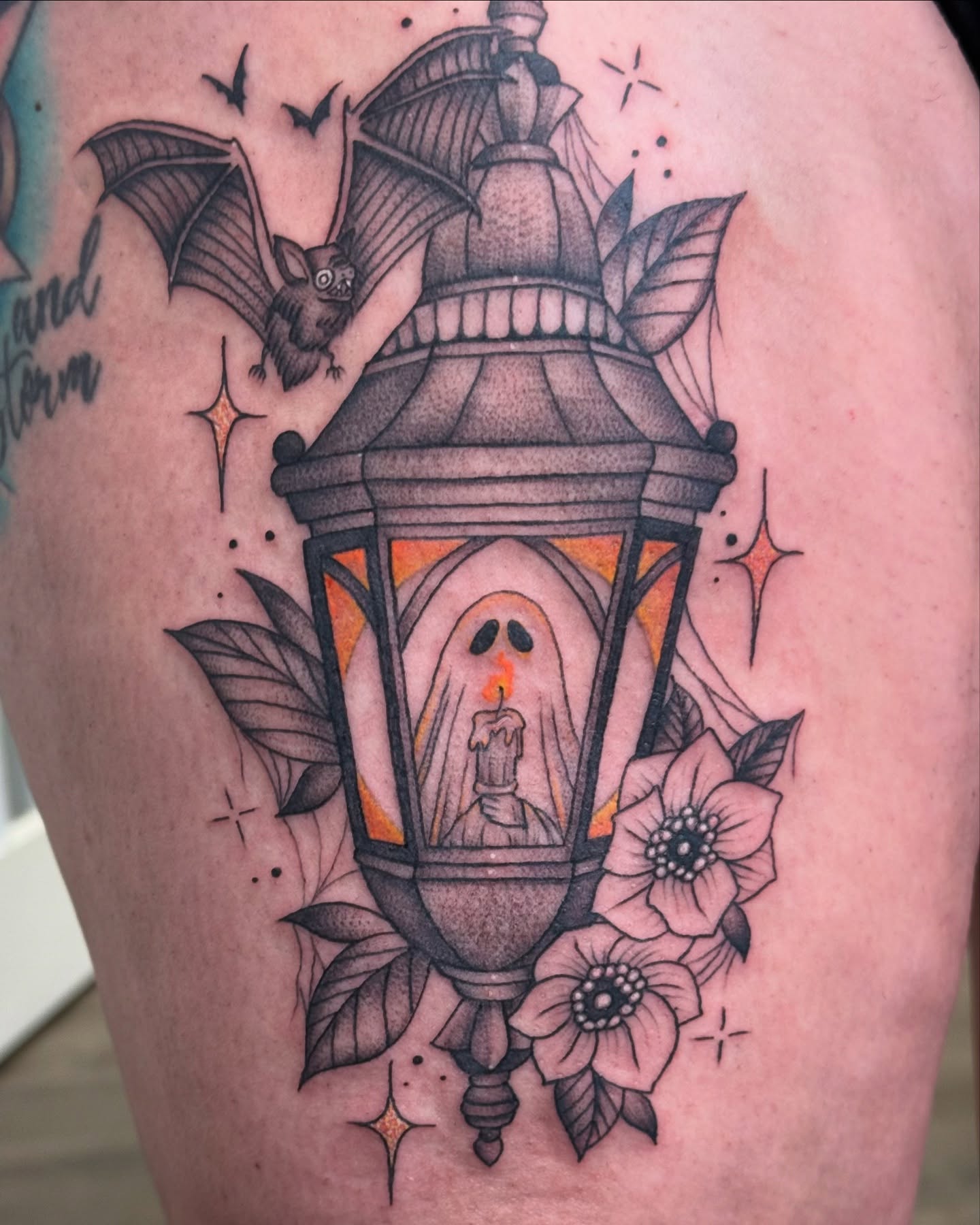 Ghost in lantern American traditional tattoo on the thigh by Alexx Colombo
