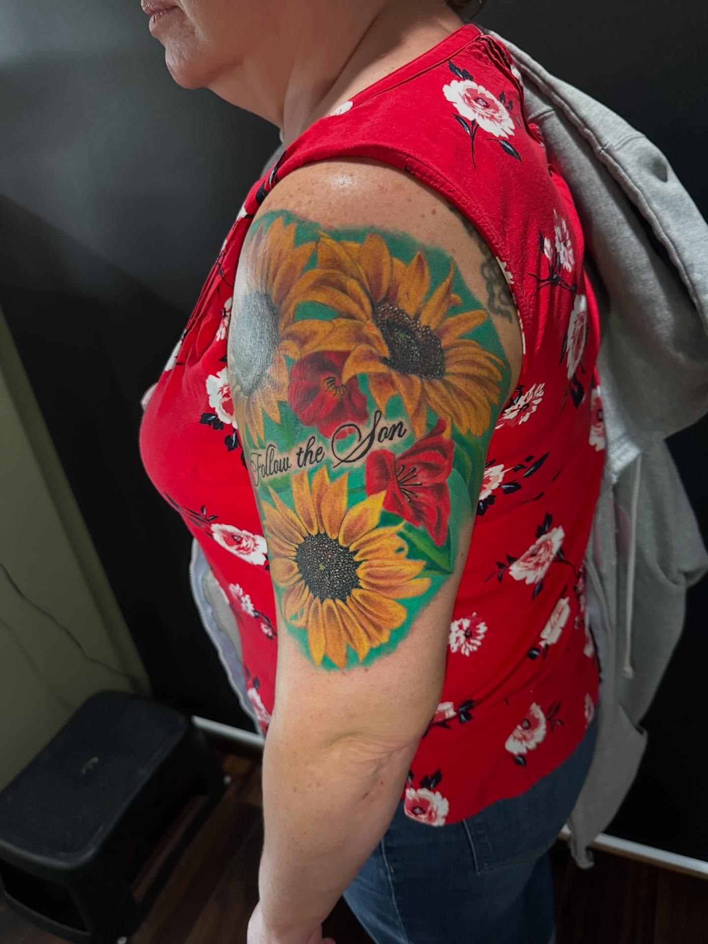 Sunflowers realism tattoo on the upper arm by George Zabala, Rockdale, Illinois