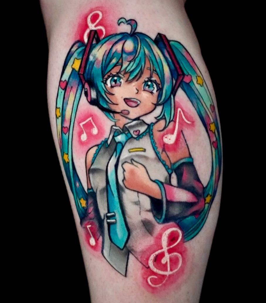 Anime character watercolor tattoo on the forearm by Breanna Fraielli