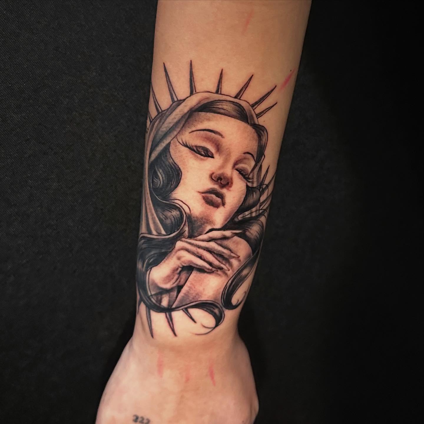 Woman with crown realism tattoo on the forearm by George Zabala, Rockdale, Illinois