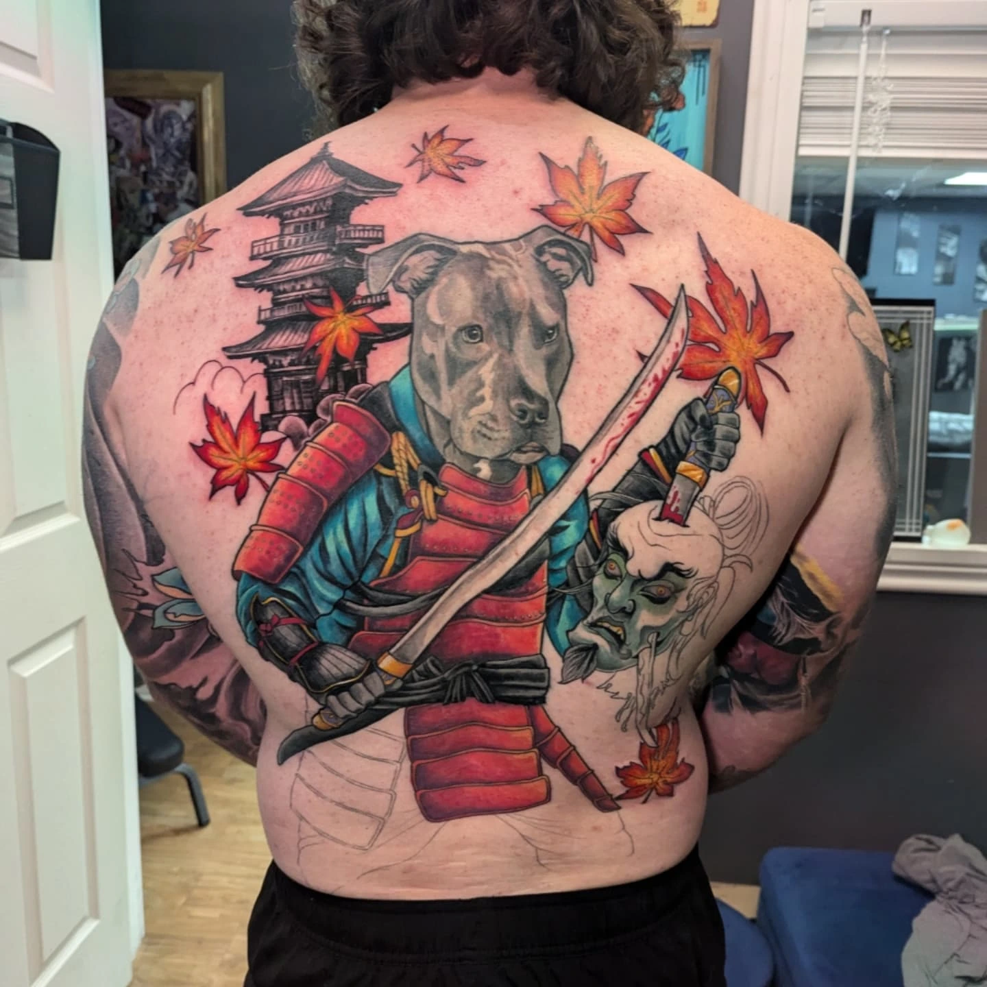 Dog samurai japanese irezumi tattoo on the back by Bethany Jane Tattoos