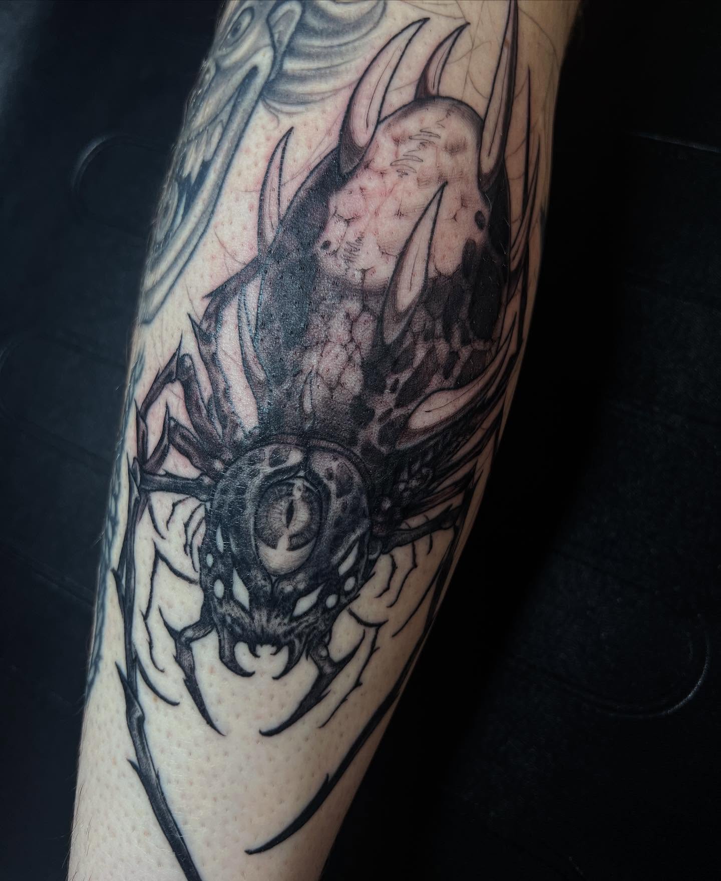 Tattoo by @chadmc509 — black_and_grey, dark_realism
