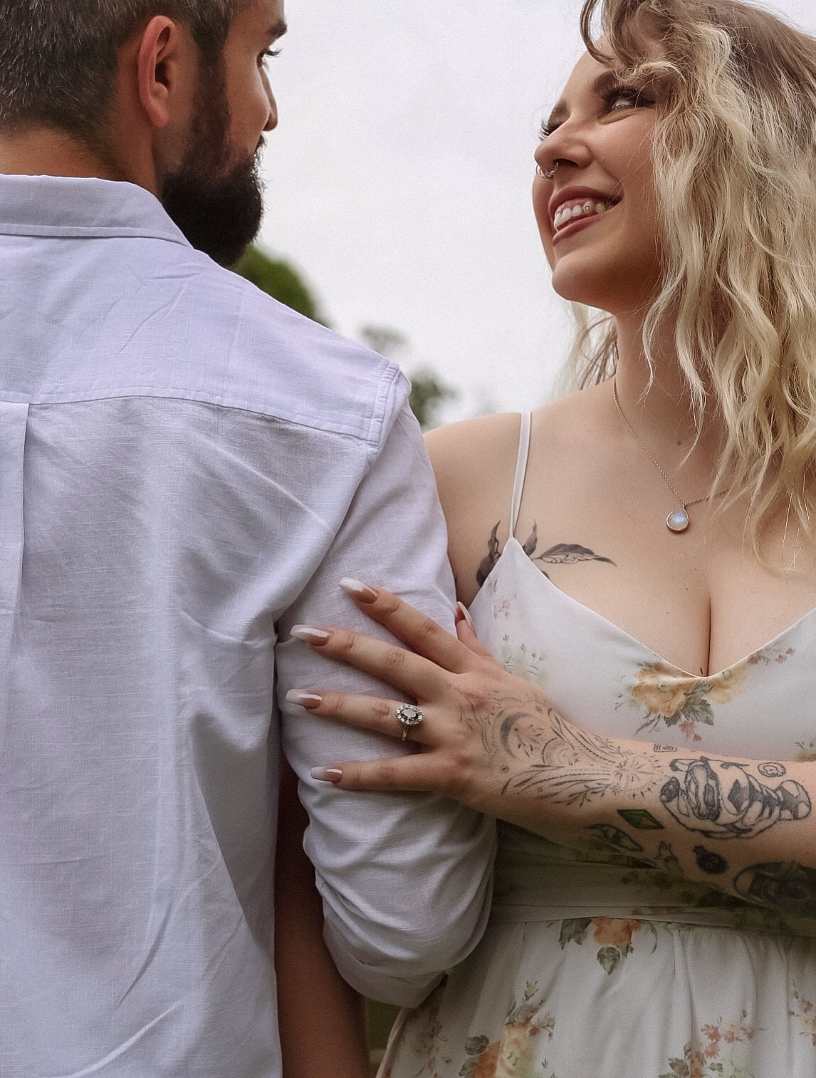 Floral dress new school tattoo on the upper arm by caliope yiannos