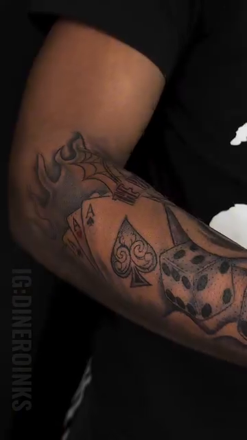 Dog with dice and cards realism tattoo by Dinero Inks