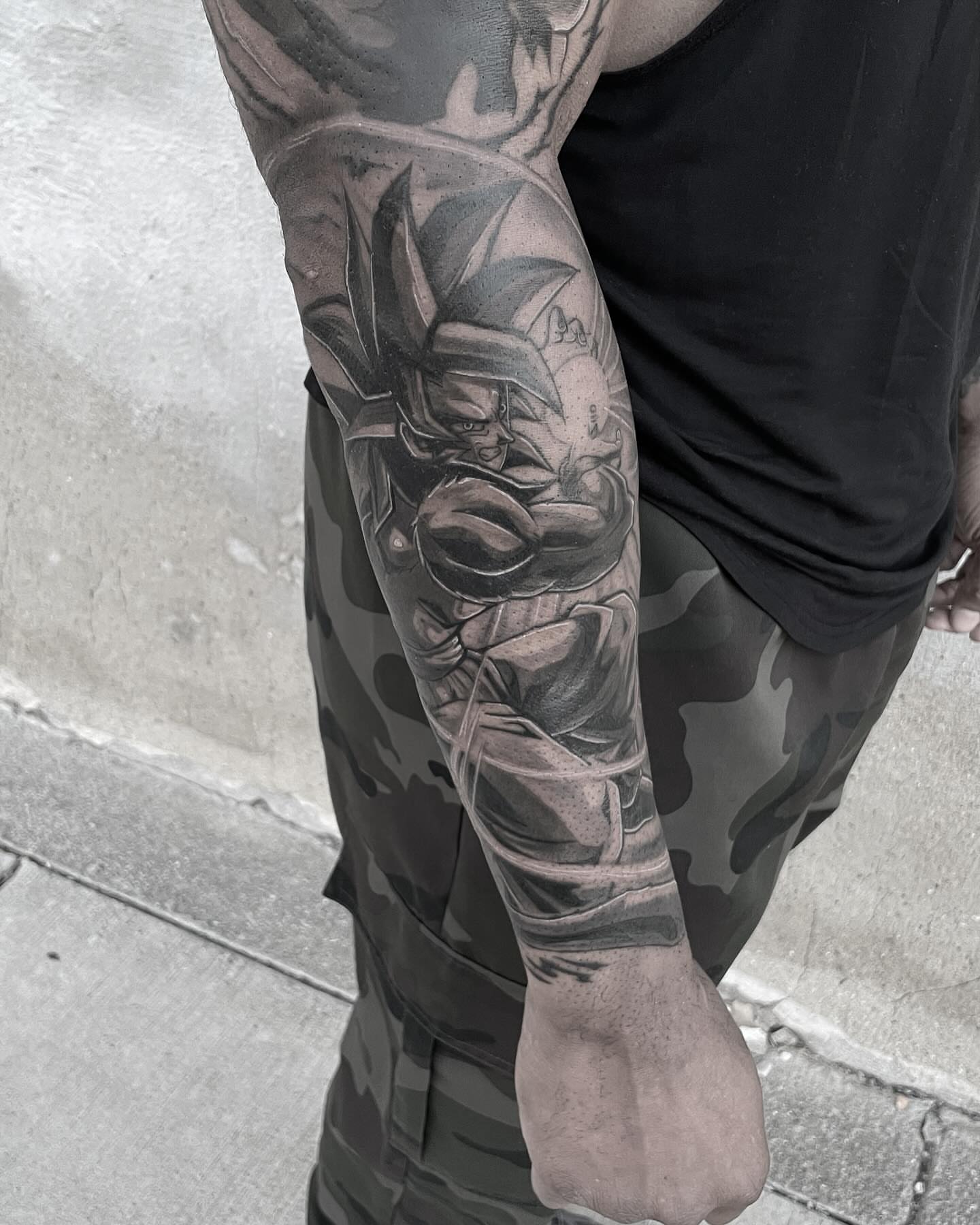 Anime character anime tattoo on the forearm by mike hudson