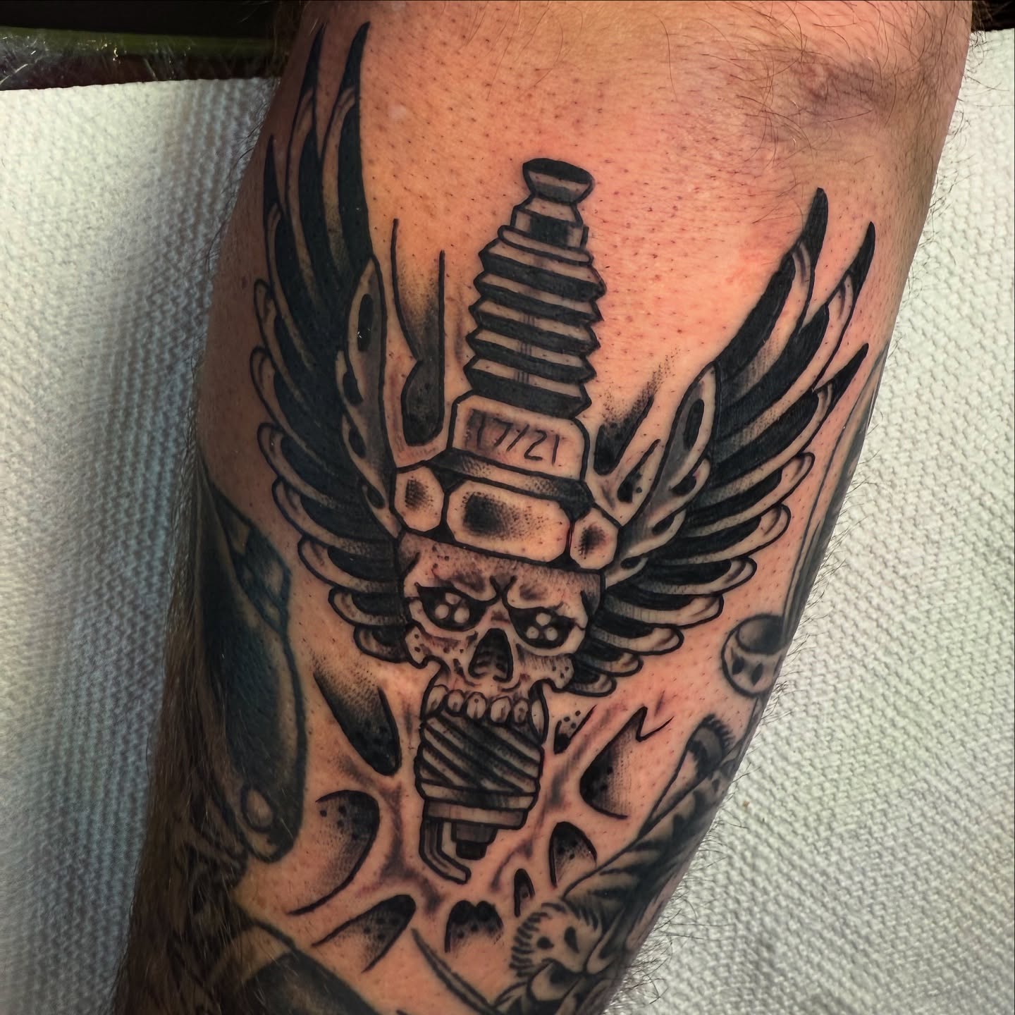 Motorcycle piston with wings American traditional tattoo on the forearm by πππ’π―π’π¨ πππΆπ©π¬π―π, Manchester, New Hampshire