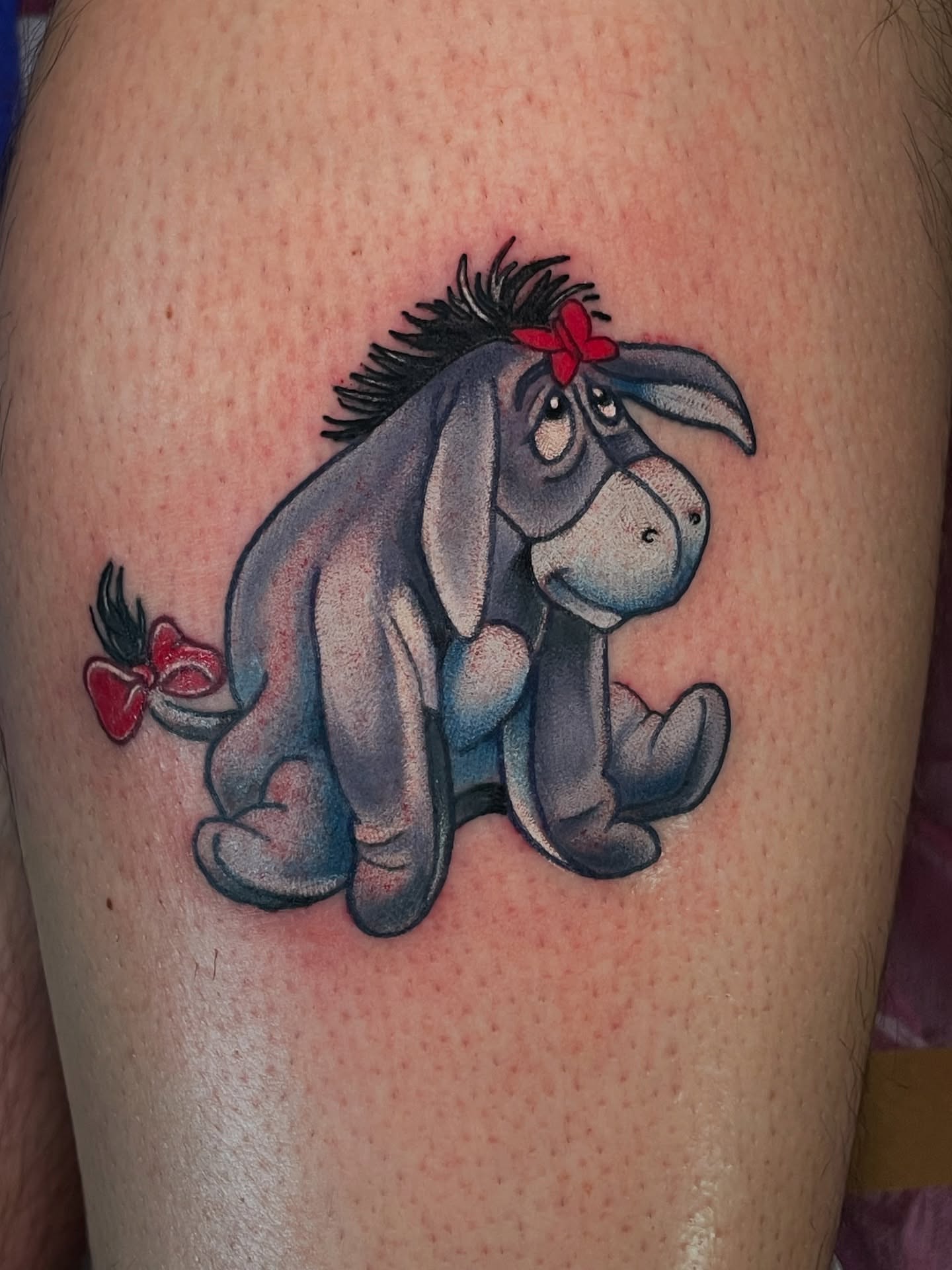 Eeyore realism tattoo on the thigh by Kimberly Parton- Chapel Hill Tattooer, Chapel Hill, North Carolina