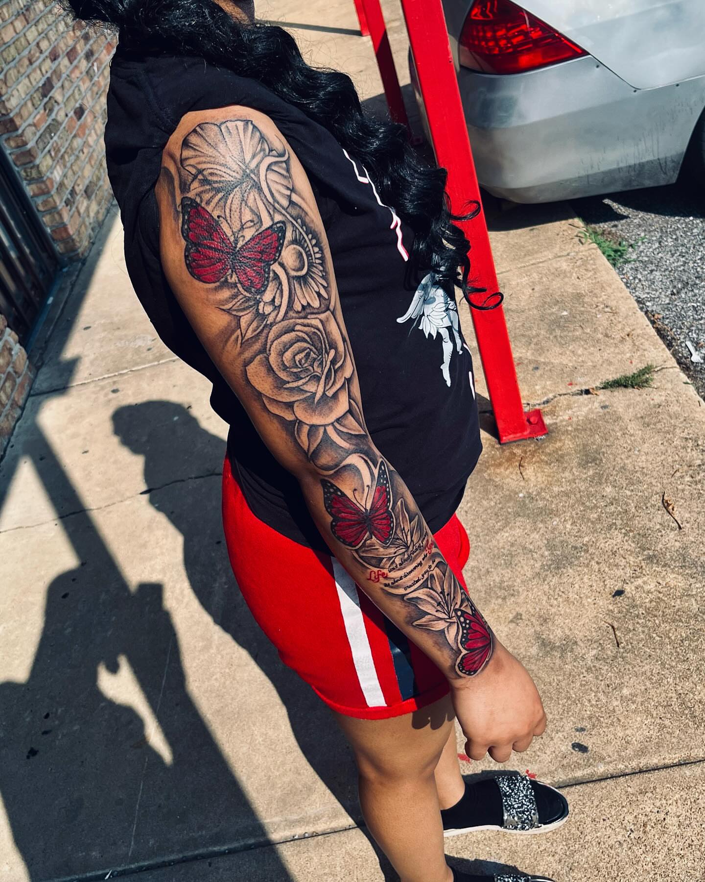 Butterfly and roses American traditional tattoo on the forearm by GrindHard Quen