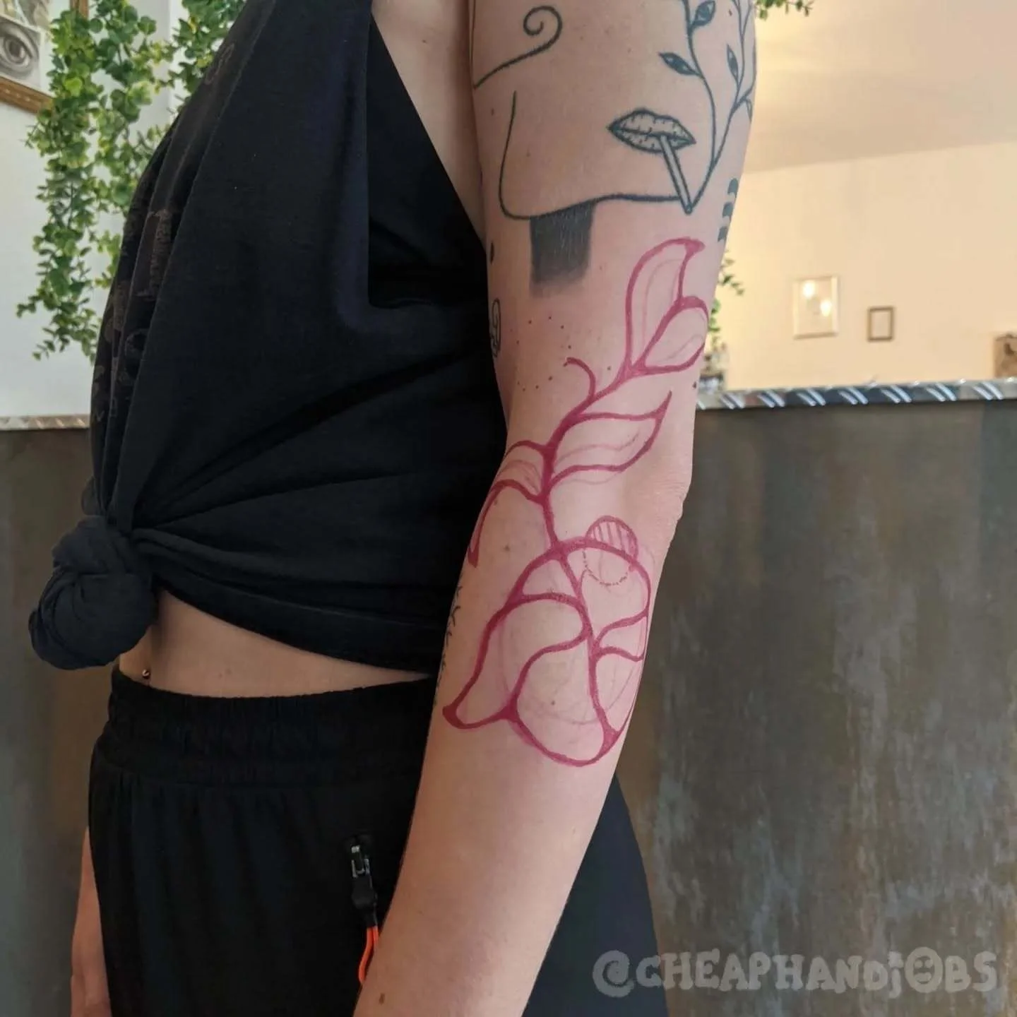 Floral vine dotwork tattoo on the forearm by @cheaphandjobs, Leipzig, Germany