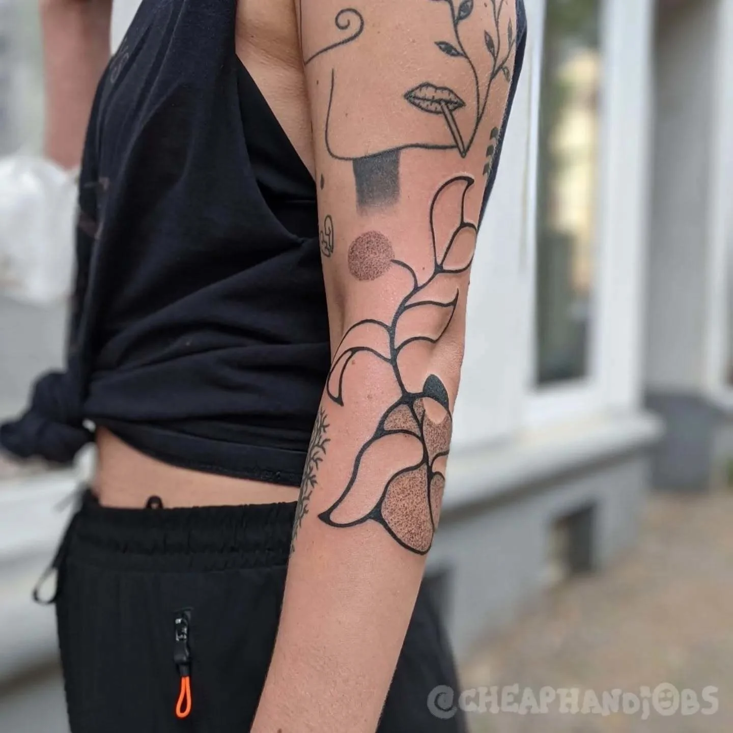 Floral dotwork tattoo on the forearm by @cheaphandjobs, Leipzig, Germany