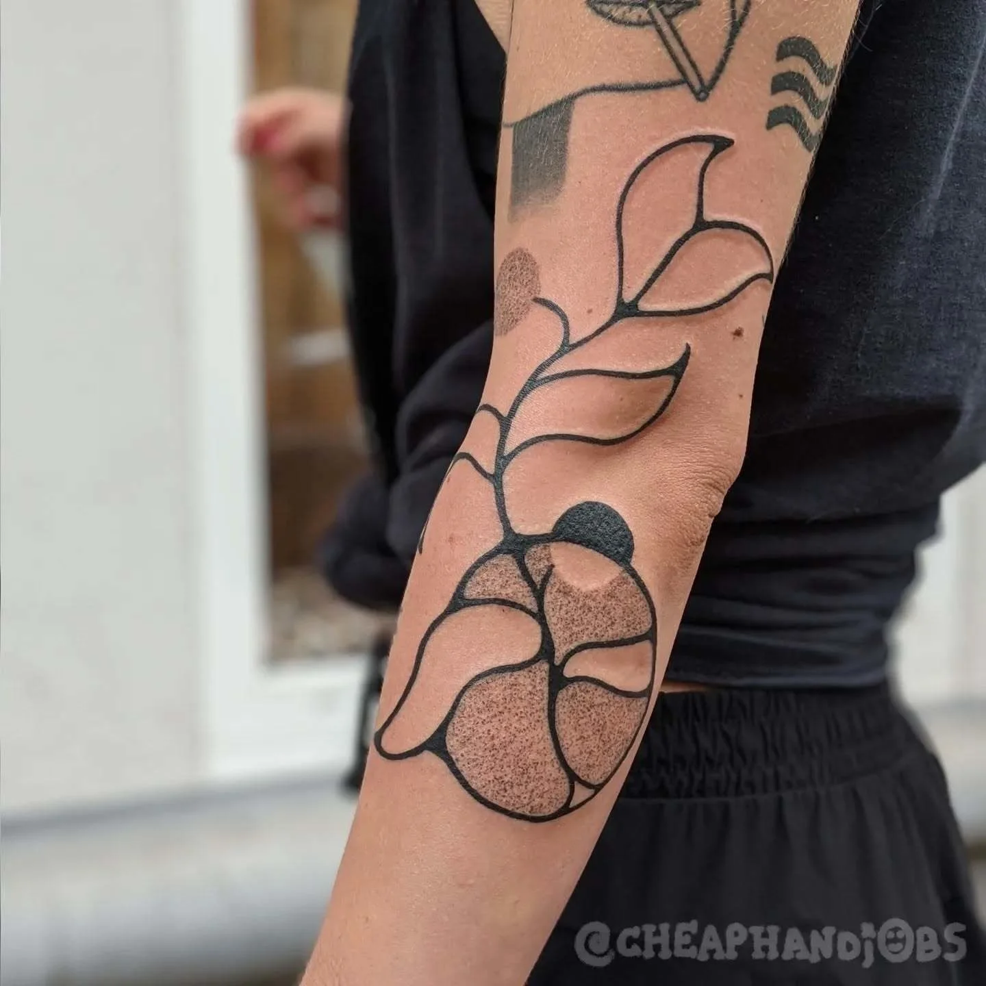 Flower dotwork tattoo on the forearm by @cheaphandjobs, Leipzig, Germany