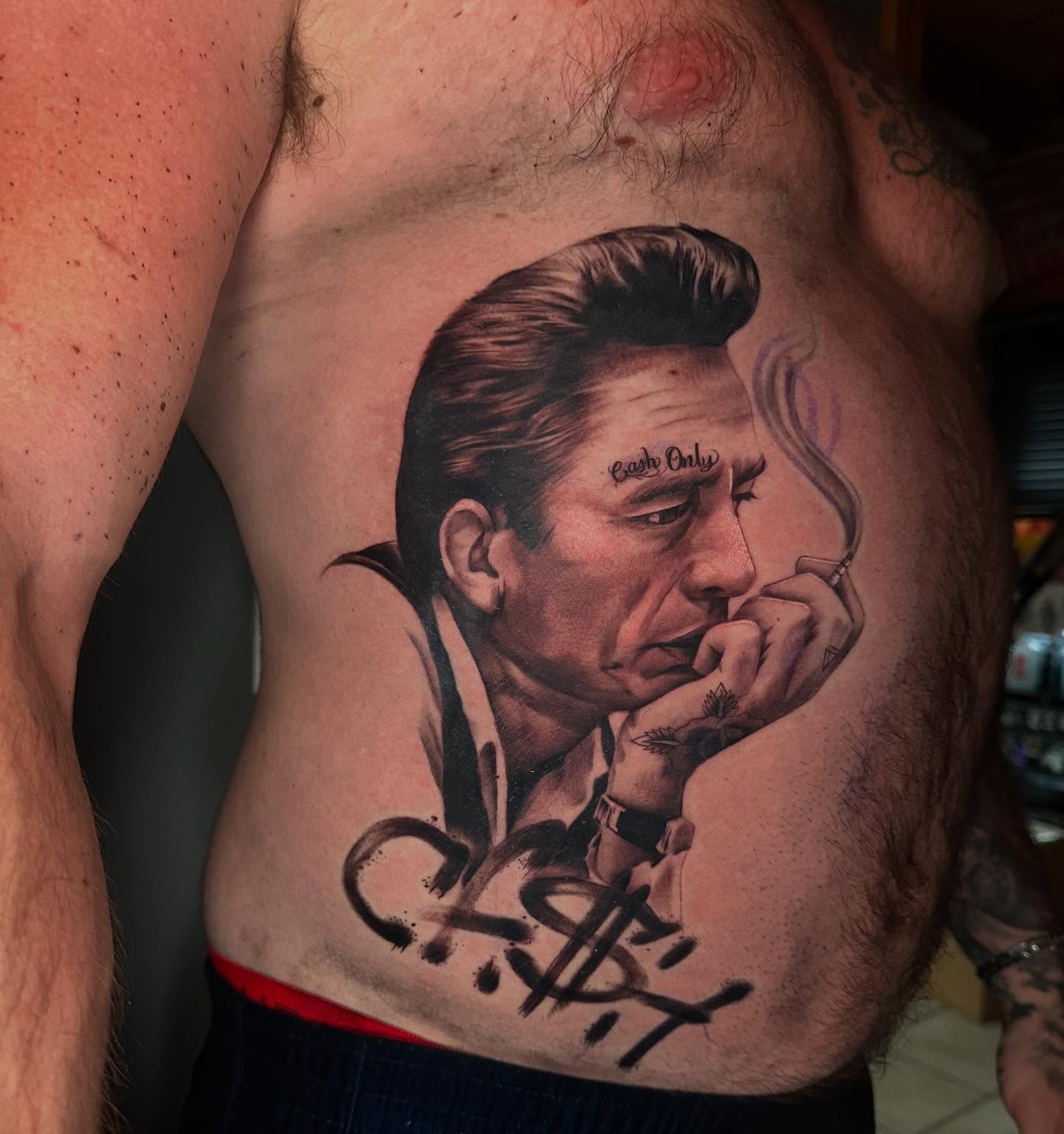 Portrait of Johnny Cash realism tattoo on the chest by T, Saugus, Massachusetts